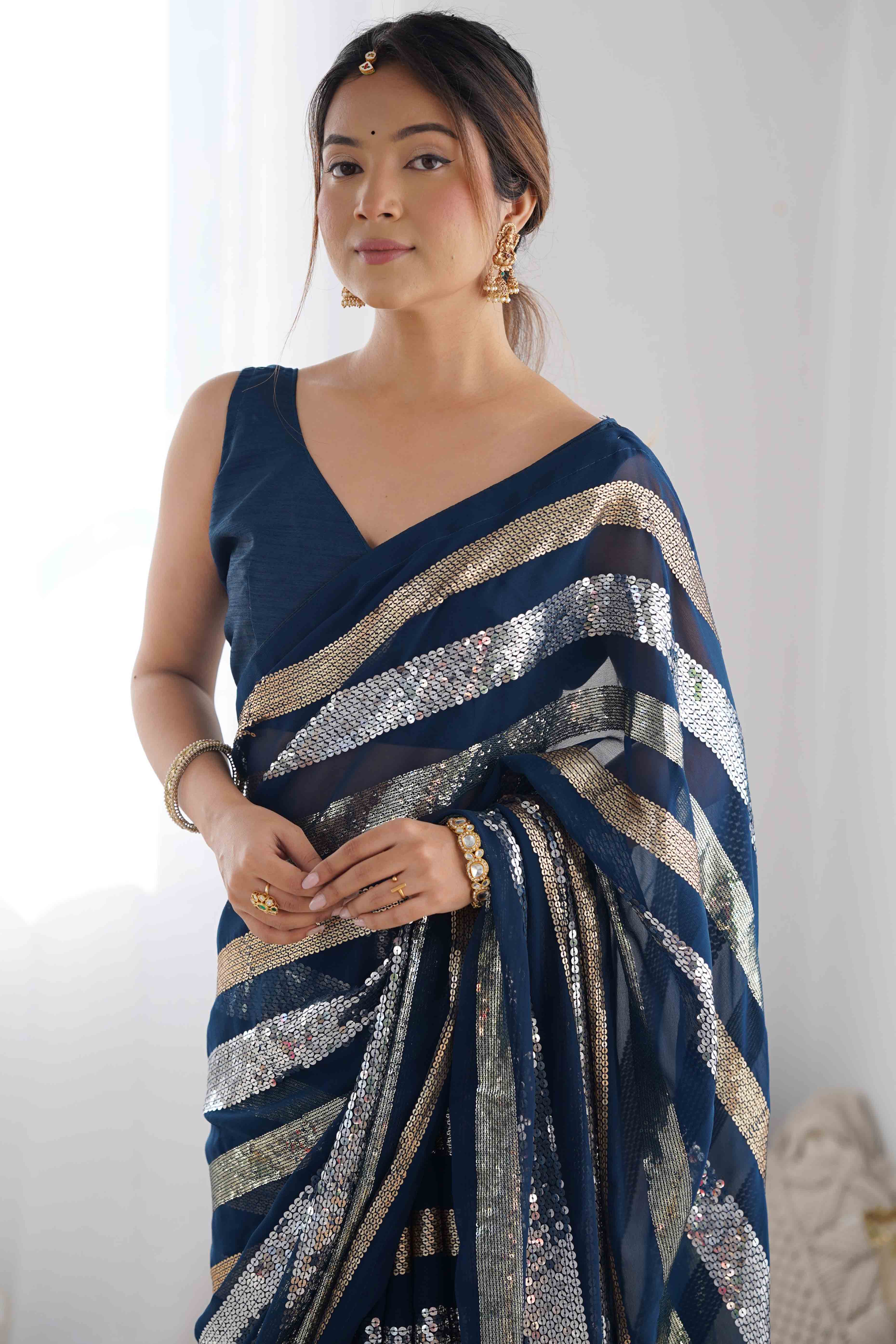 Teal Sequins Embroidered Georgette Saree