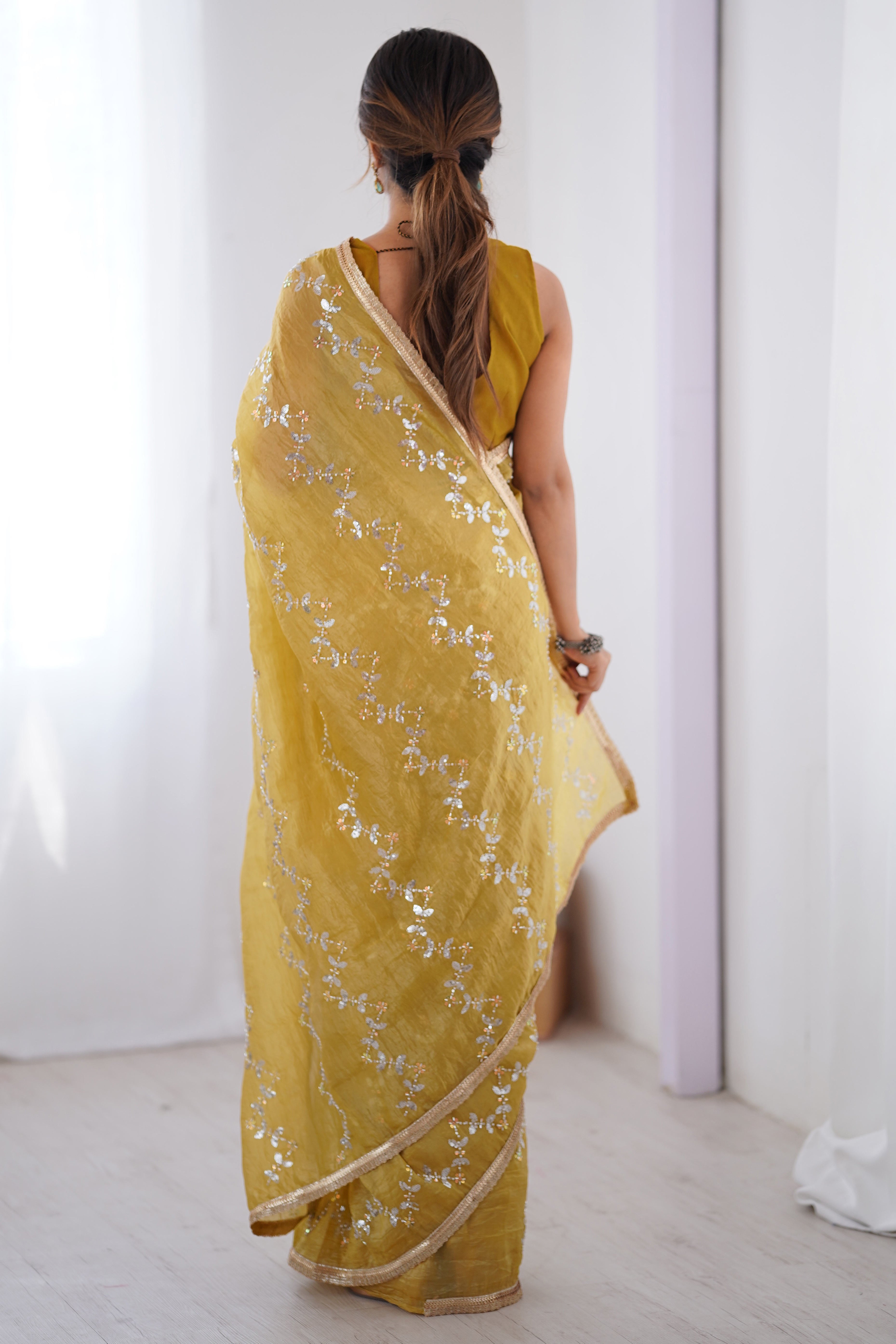 Dazzling Mustard Yellow Organza Saree Accented with Sequin, Bead & Stone Work and Delicate Lace Detailing