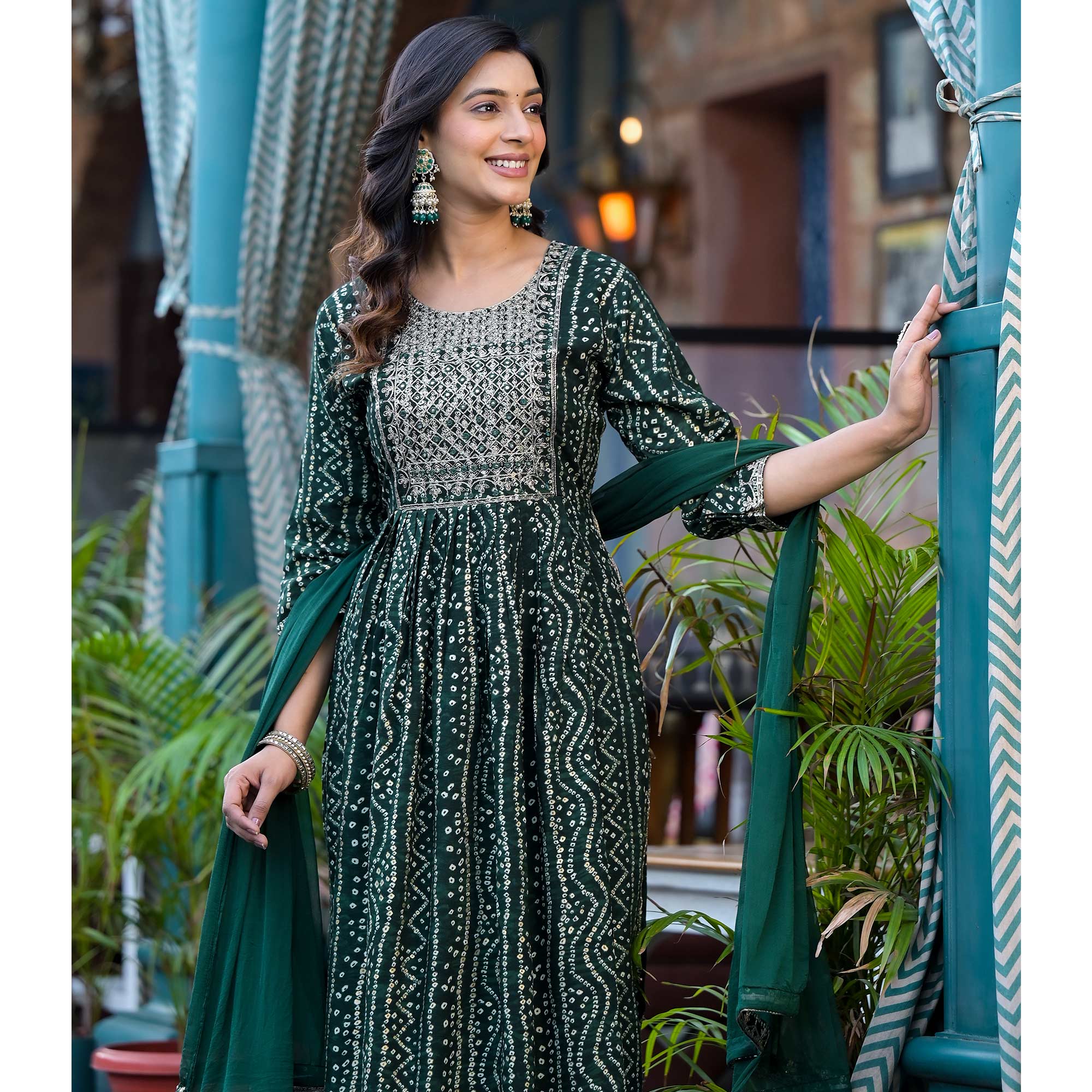 Green Bandhani Printed Naira Cut Rayon Salwar Suit