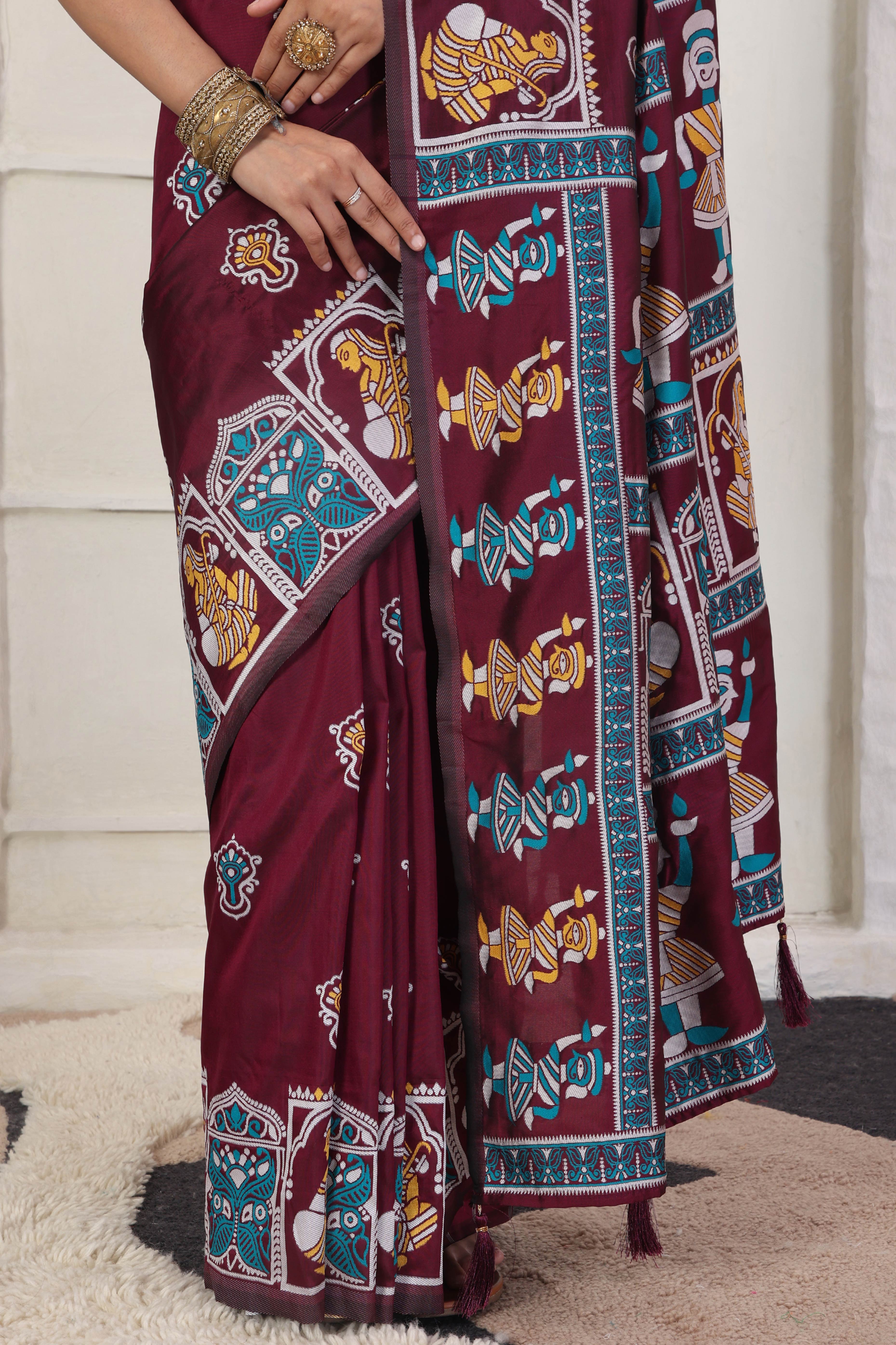 Dark Wine Ethnic Madhubani Print Silk Blend Saree Enhanced With Tassel Pallu Accents