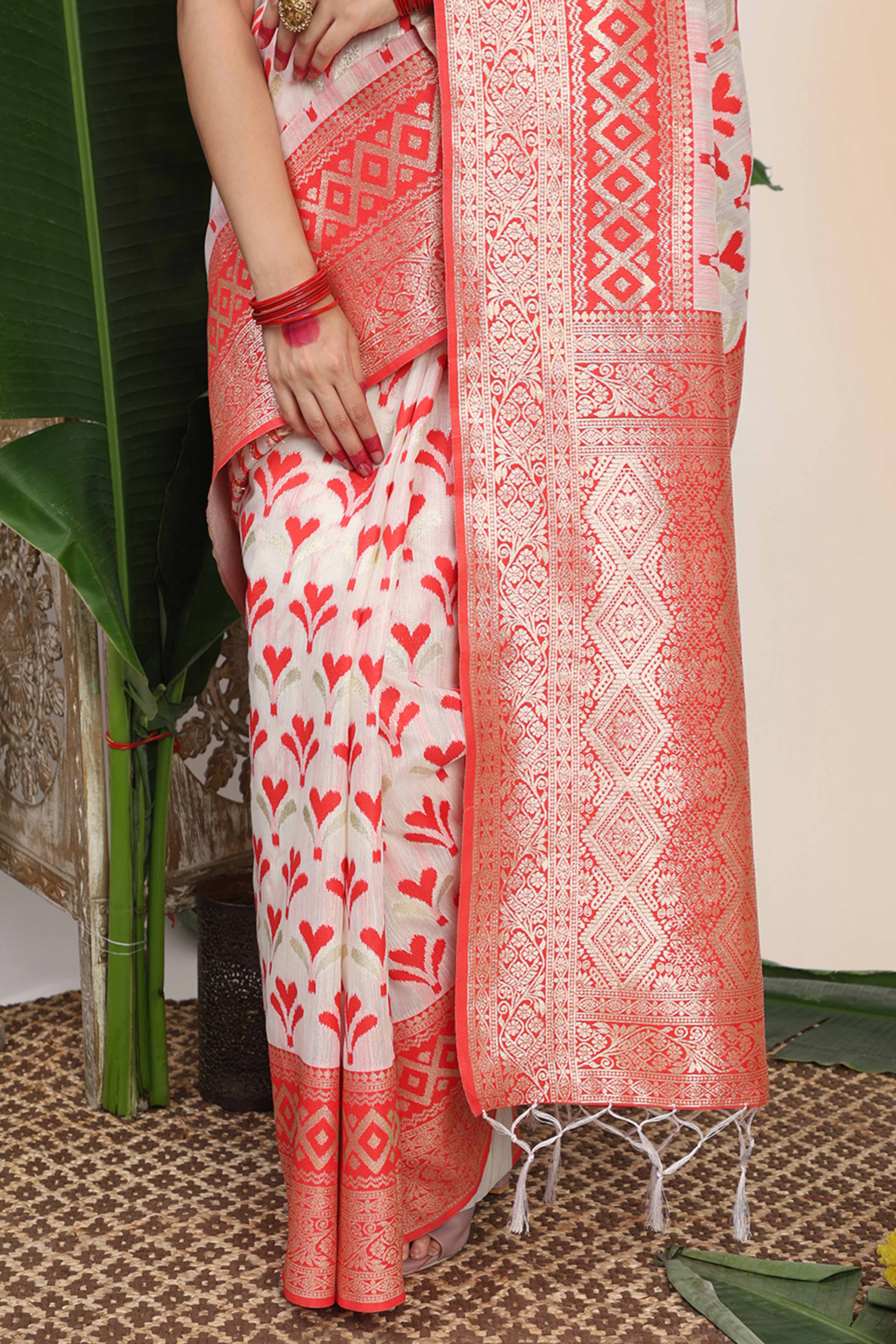 White & Red Fusion Linen Cotton Saree With Classic Zari Weaving And Soft Tassel Accents