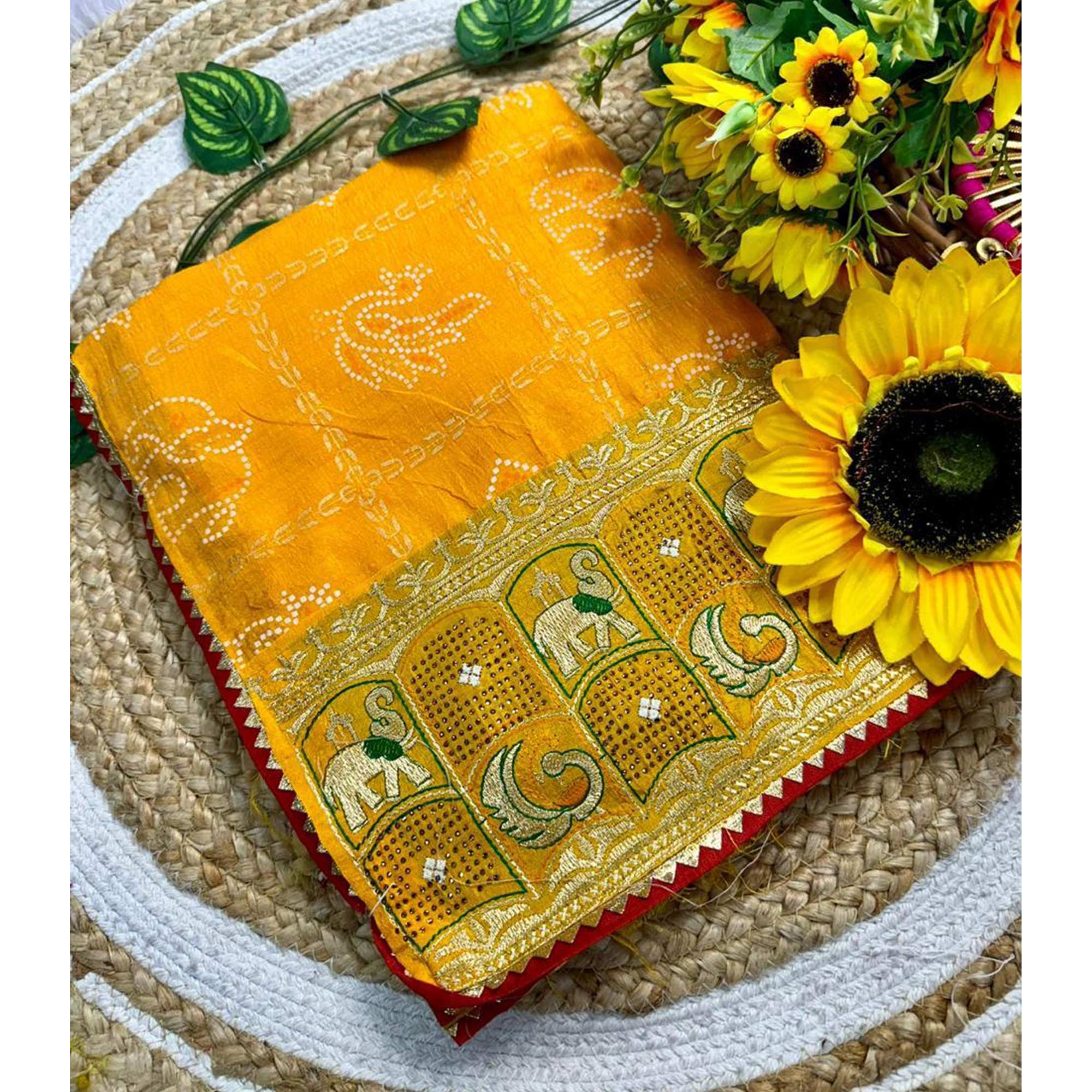 Yellow Vichitra Silk Saree Featuring Bandhani Patterns and Graceful Embroidered Borders