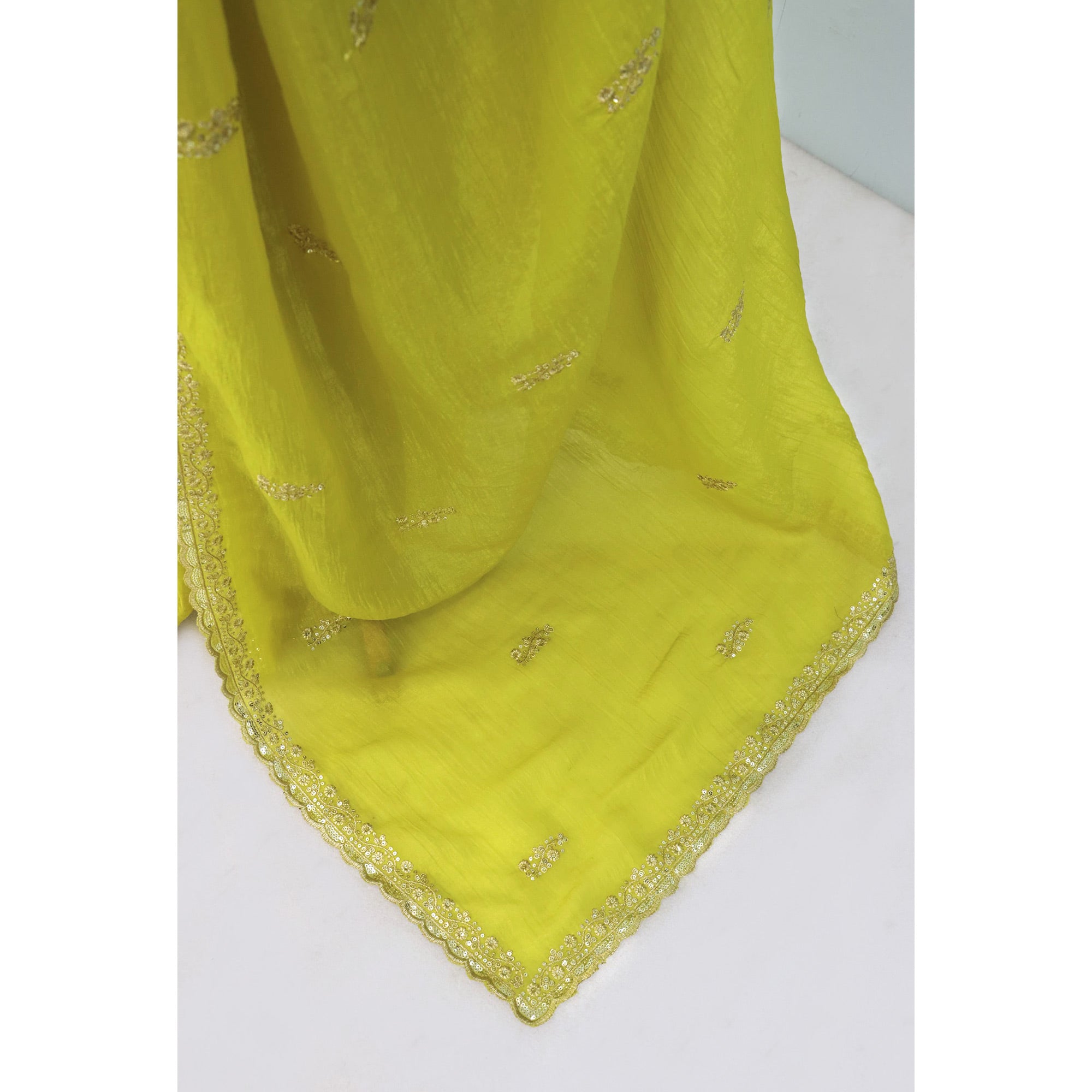 Enchanting Green Crunchy Crush Saree With Delicate Floral Thread Embroidery & Sparkling Sequins Accents