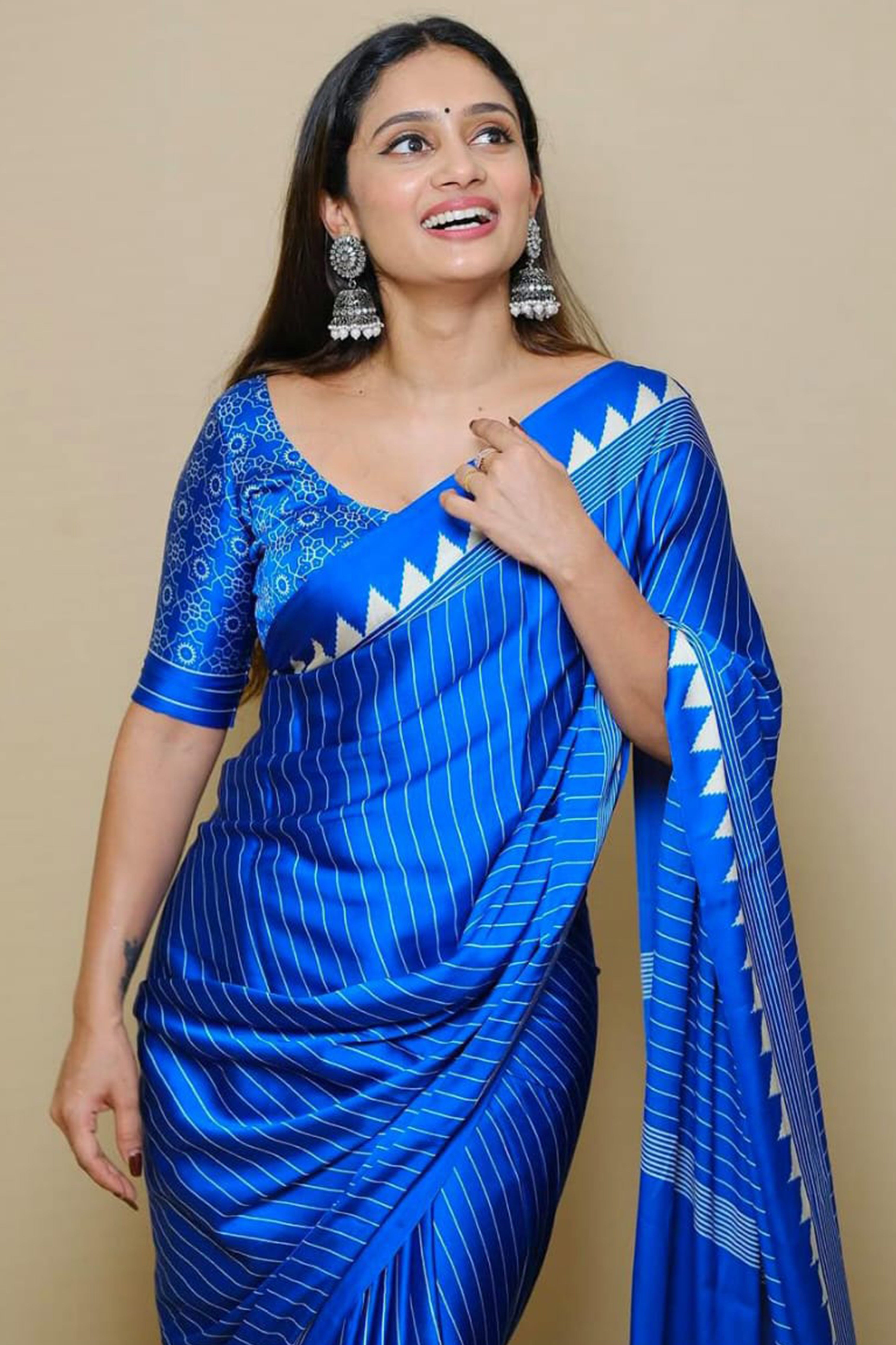 Blue Crepe Saree with Bold Striped Print and Smooth Finish for Partywear