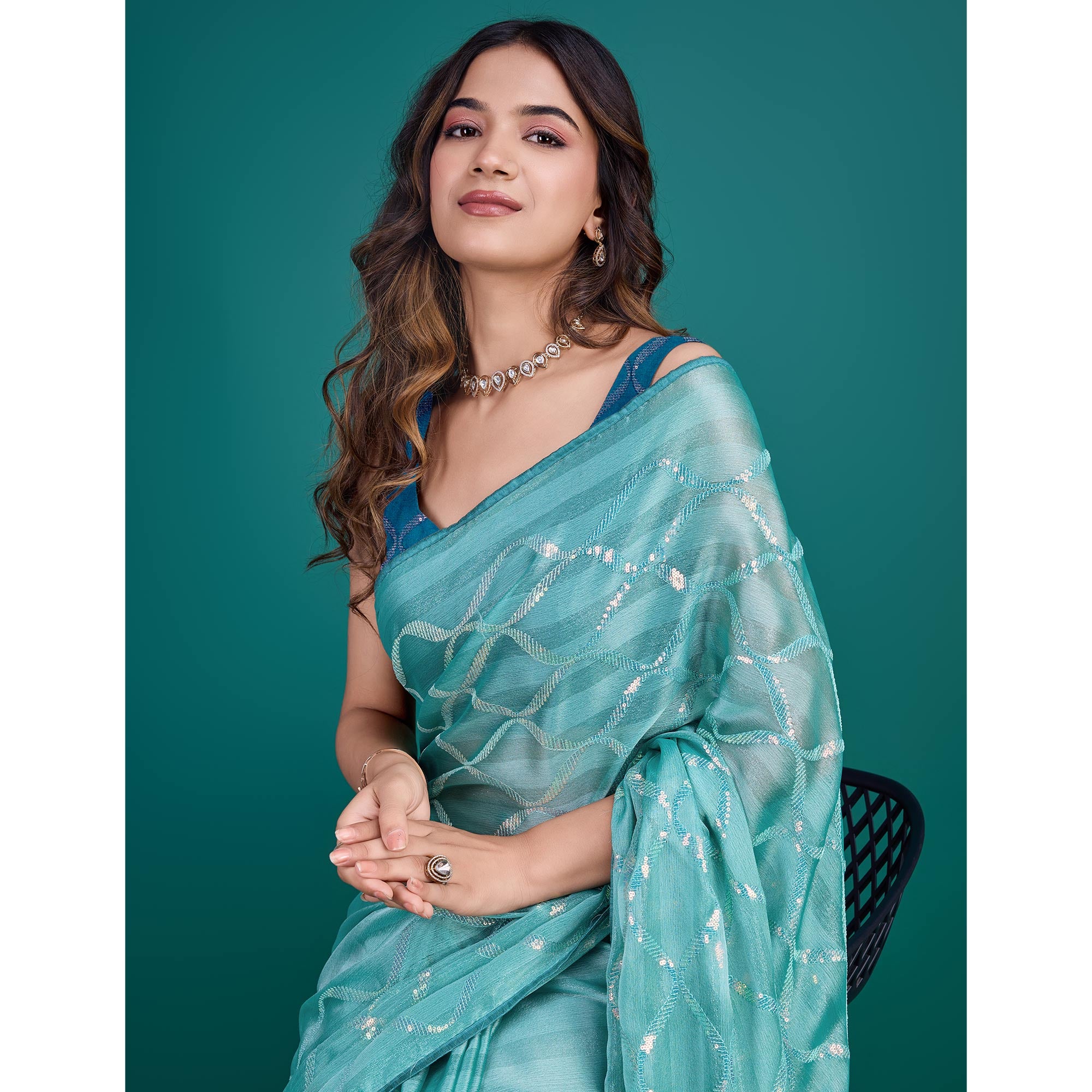 Turquoise Sequins Embroidered Georgette Saree