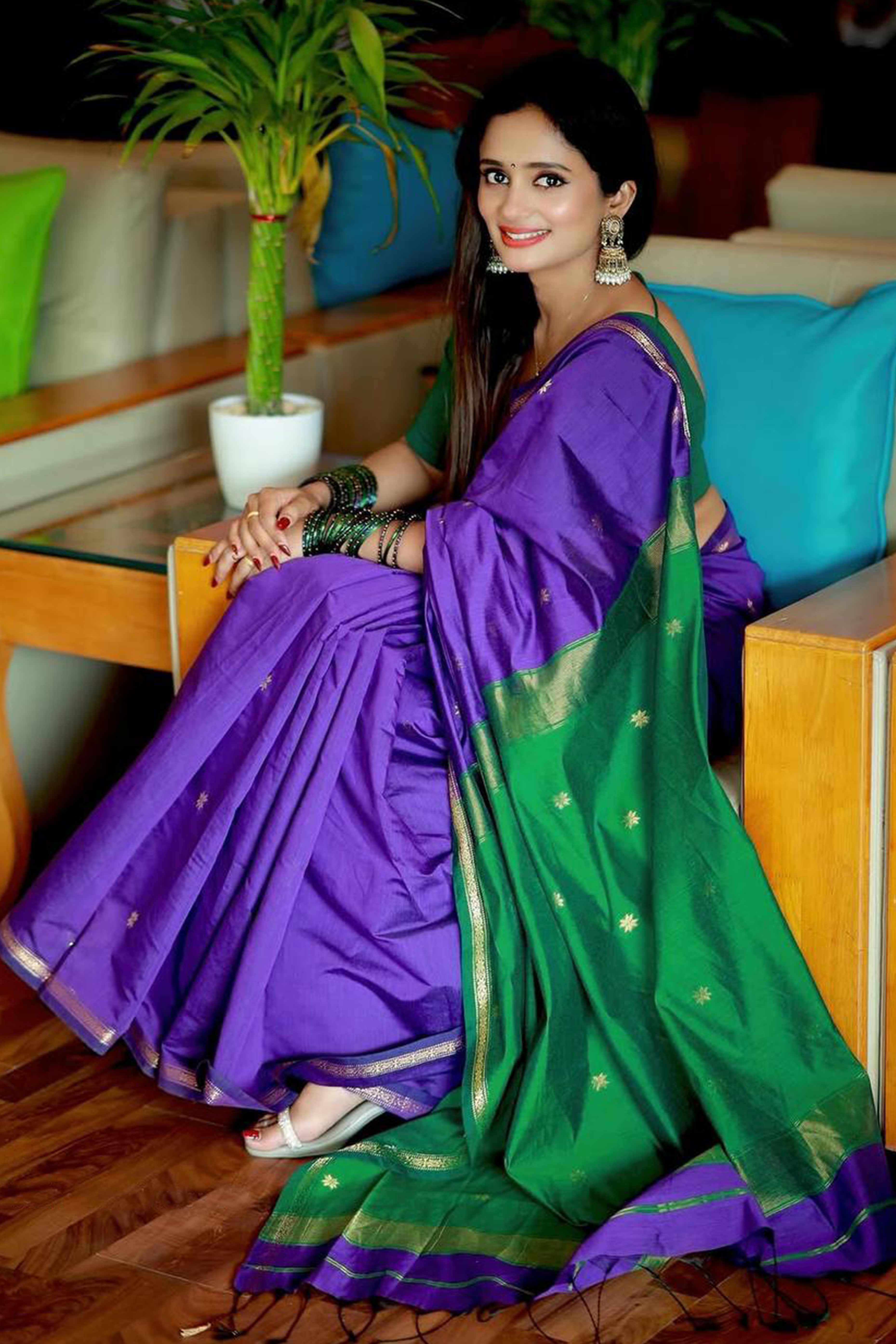 Purple Linen Cotton Saree Adorned with Intricate Zari Butti Weaving for a Refined Ethnic Appeal