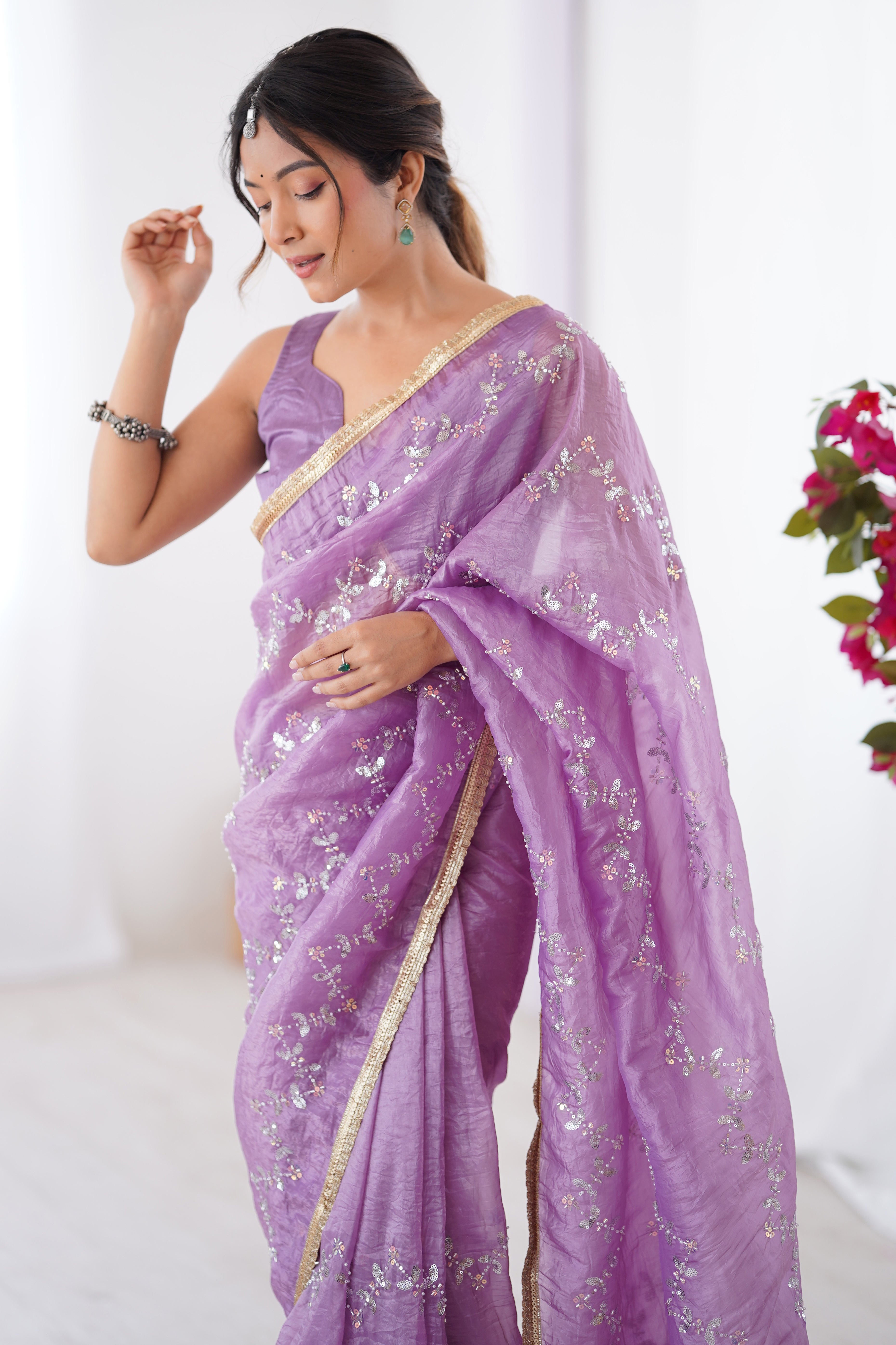 Dazzling Lavender Organza Saree Accented with Sequin, Bead & Stone Work and Delicate Lace Detailing