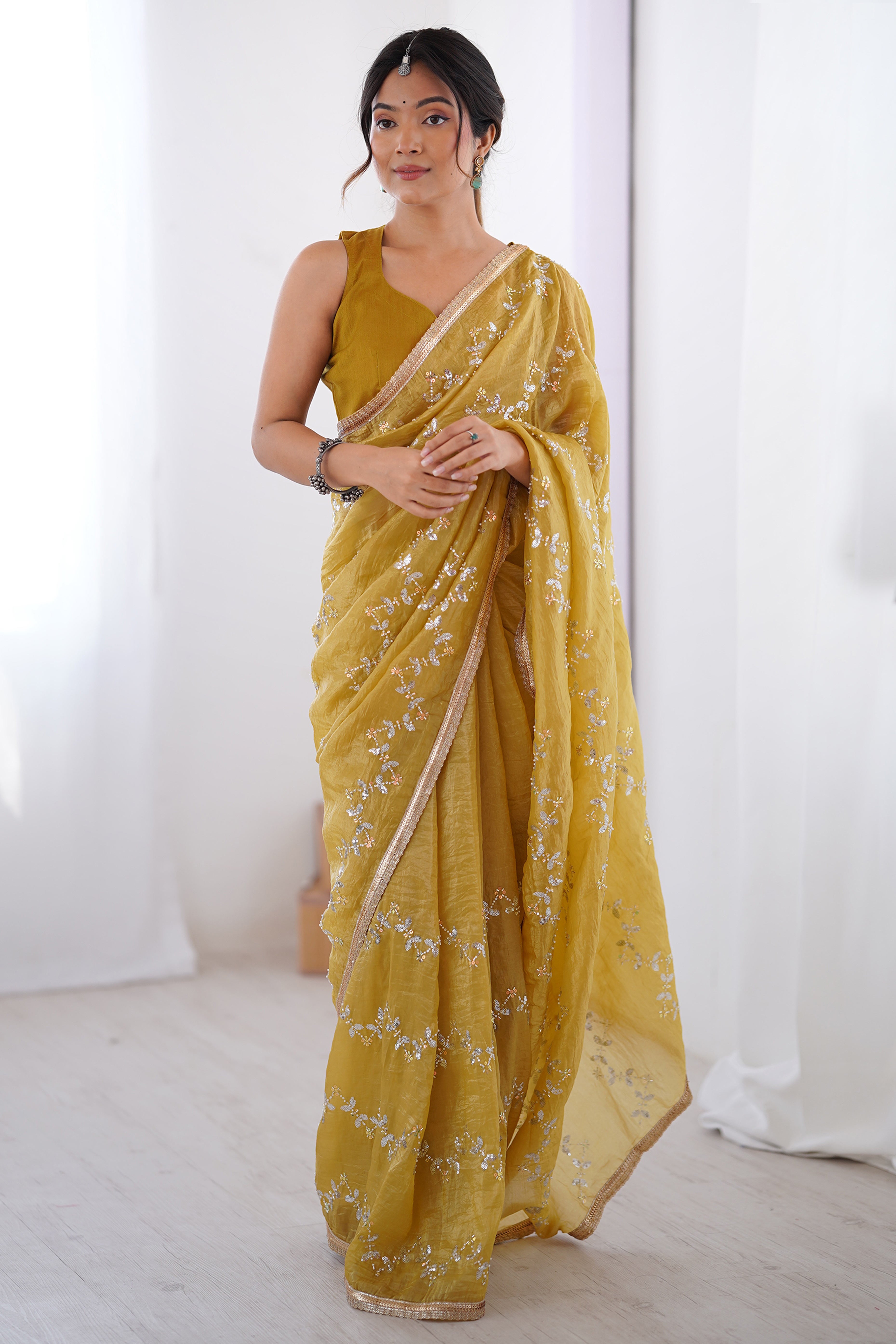 Dazzling Mustard Yellow Organza Saree Accented with Sequin, Bead & Stone Work and Delicate Lace Detailing