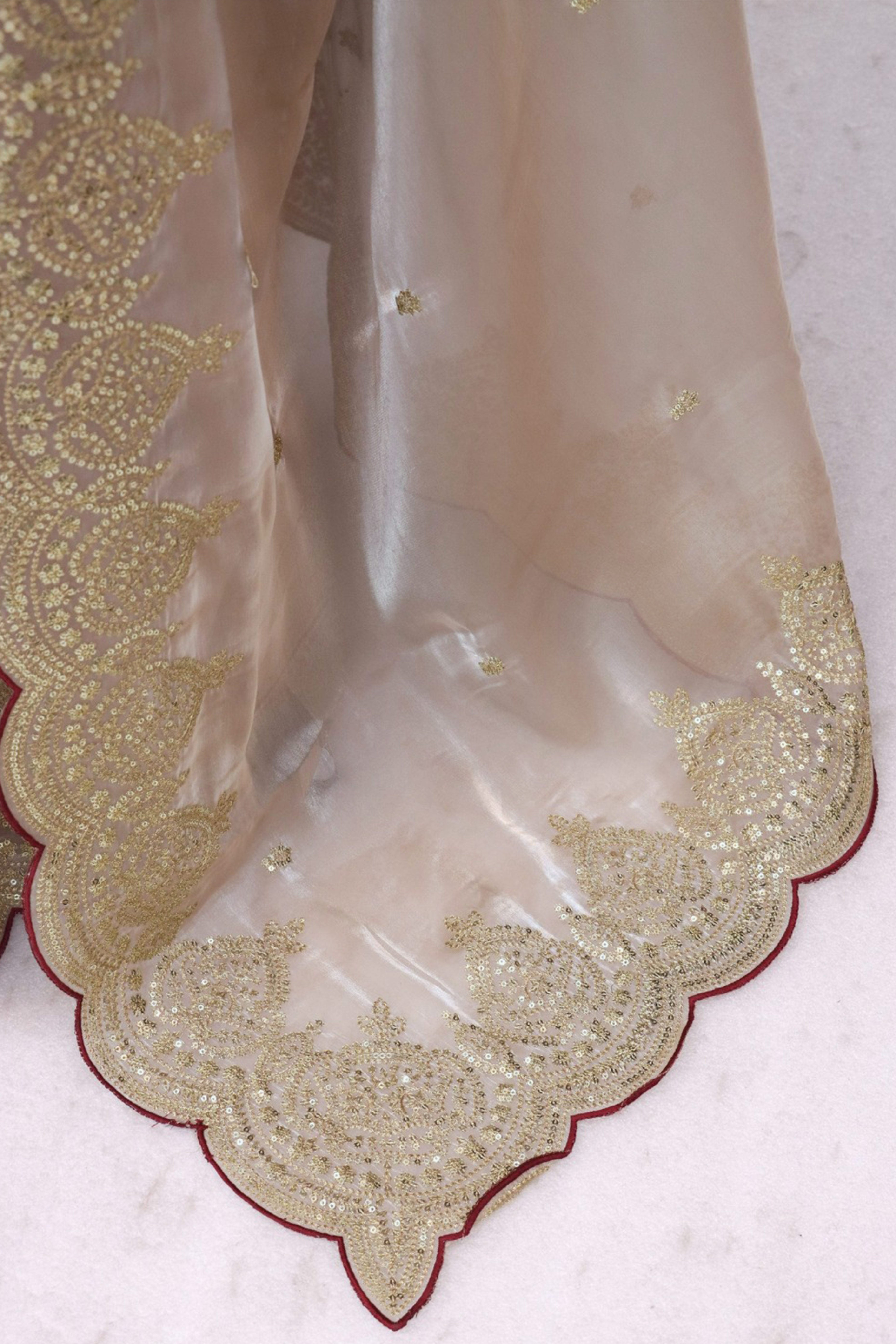 Stylish Chikoo Jimmy Choo Satin Silk Saree Beautified with Floral Zari Embroidery & Sequins Work