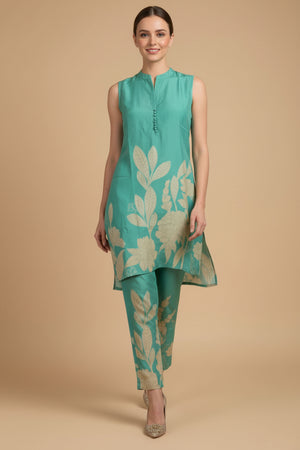 Sea Green Muslin Sleeveless Co-Ord Set Adorned With Whimsical Floral Prints