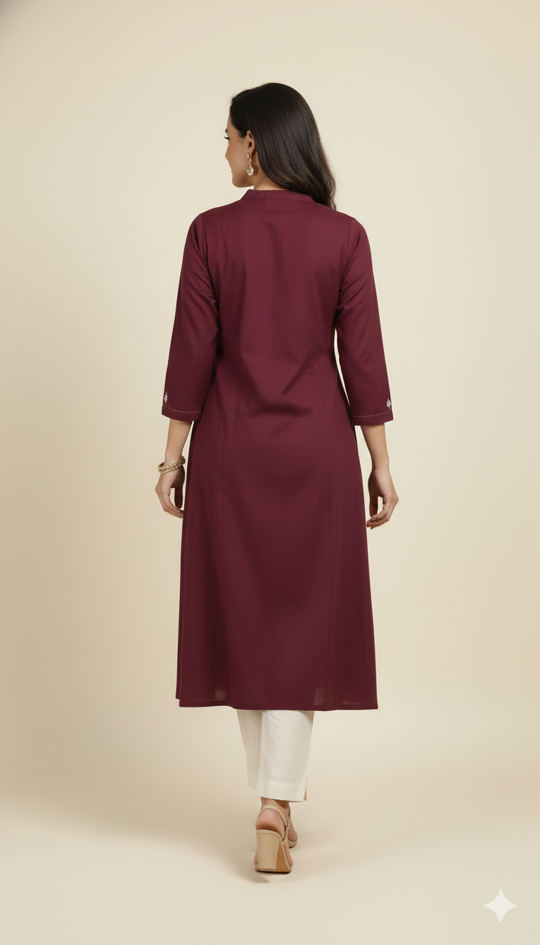 Maroon Comfortable Pure Cotton A-Line Kurti Accented with Artistic Floral Embroidered Patterns