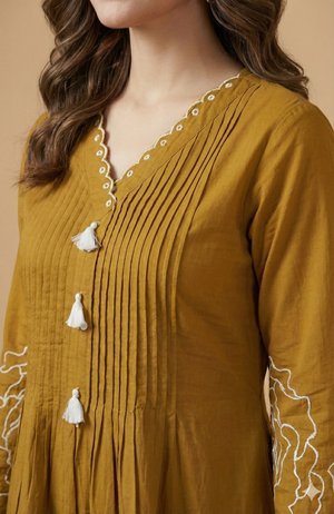 Stylish Mustard Pure Cotton A-Line Top Bottom Set Accented with Graceful Floral Patterns