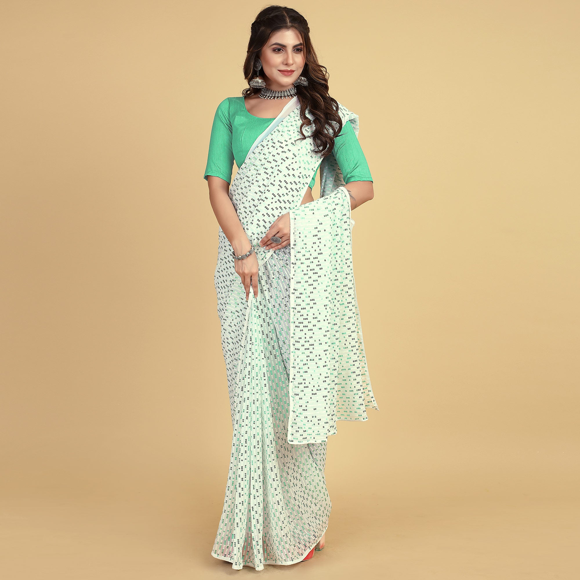 White & Sea Green Sequins Embroidered Georgette Saree