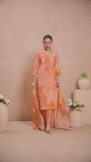 Bright Peach Organza Straight Suit Enhanced with Detailed Embroidery in Stones and Beads