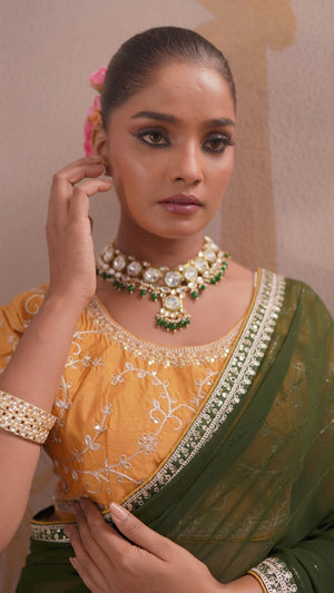 Mehendi Green Zari Embroidered Georgette Saree Accented With Sequins