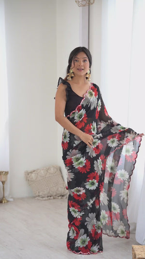 Black Georgette Saree Featuring Floral Prints & Shimmering Mirror Work Border