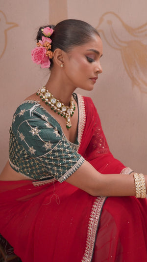 Red Zari Embroidered Georgette Saree Accented With Sequins