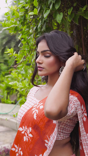 Rust Orange Pure Cotton Saree with Delicate Floral Patterns