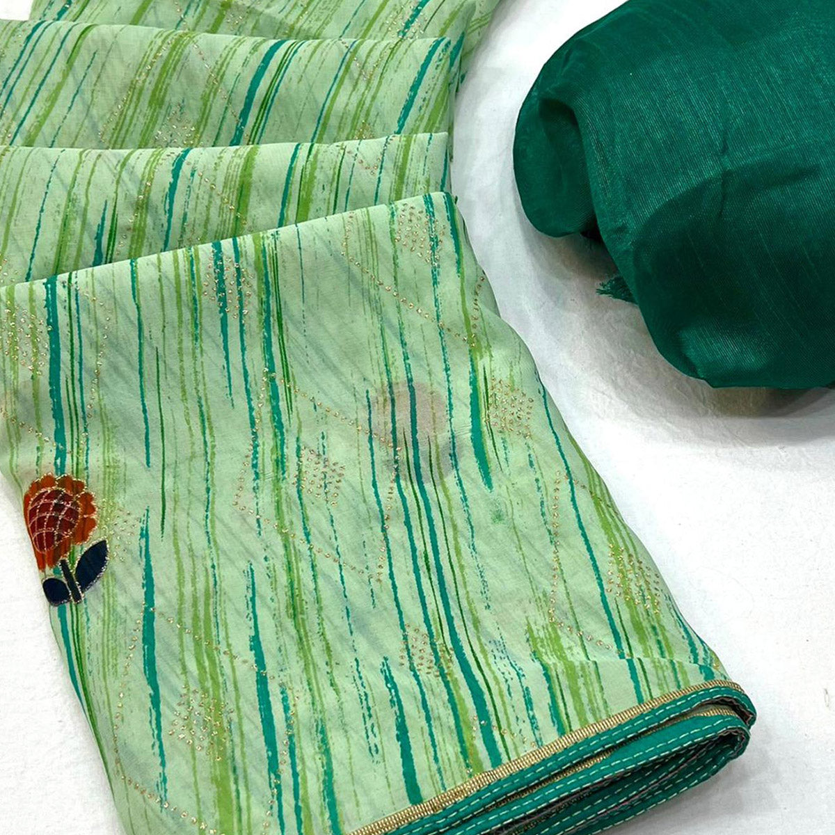 Green Printed Raw Silk Saree With Fancy Border