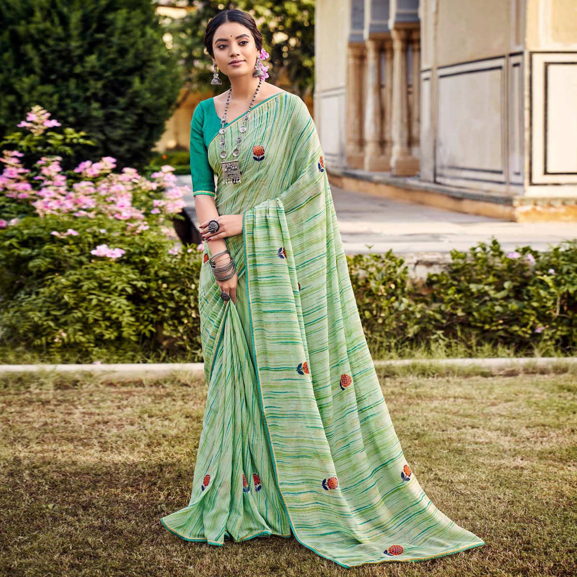 Green Printed Raw Silk Saree With Fancy Border
