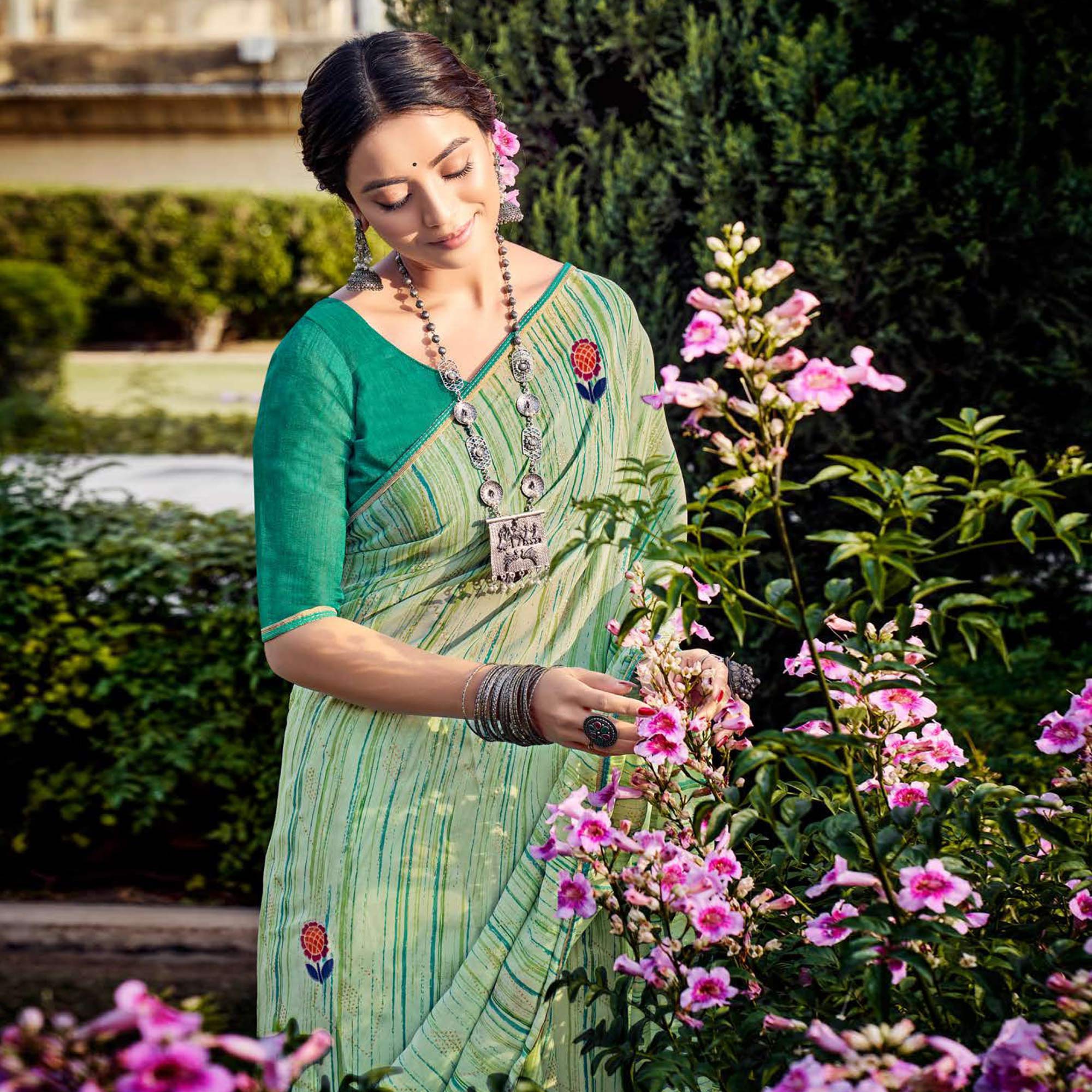 Green Printed Raw Silk Saree With Fancy Border