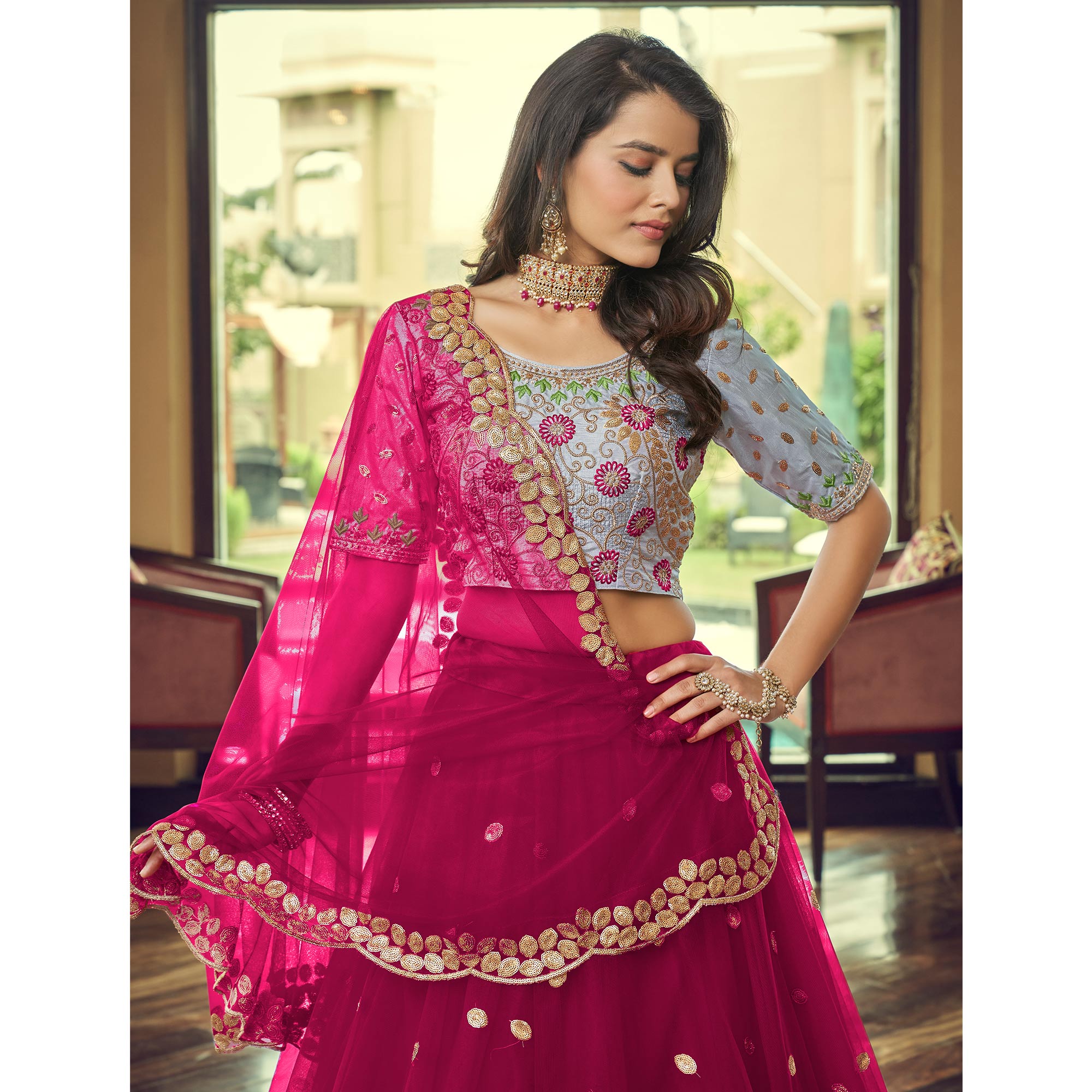 Dark Pink Sequins Embroidered Netted Lehenga Choli
