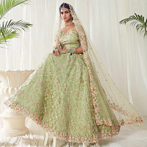Adorable Pista Green Colored Cording Thread & Sequence Embroidery Designer Wedding Wear Net With Banglori Silk Lehenga Choli - Peachmode