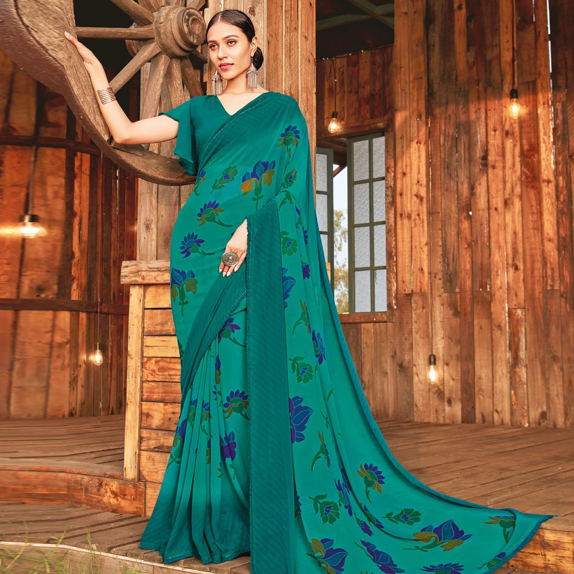 Adorable Rama Green Coloured Partywear Pure Georgette Floral Printed Saree With Fancy Lace Border - Peachmode