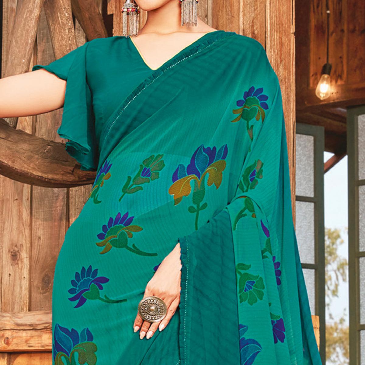 Adorable Rama Green Coloured Partywear Pure Georgette Floral Printed Saree With Fancy Lace Border - Peachmode