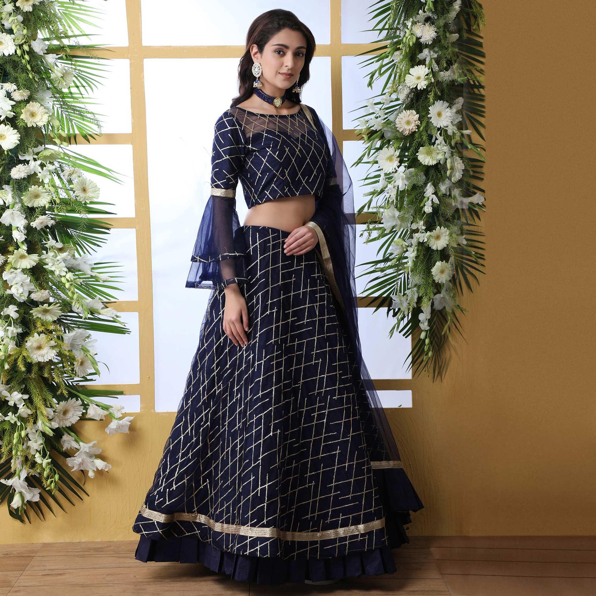 Adorning Navy Blue Colored Partywear Embroidered Netted Lehenga Choli - Peachmode