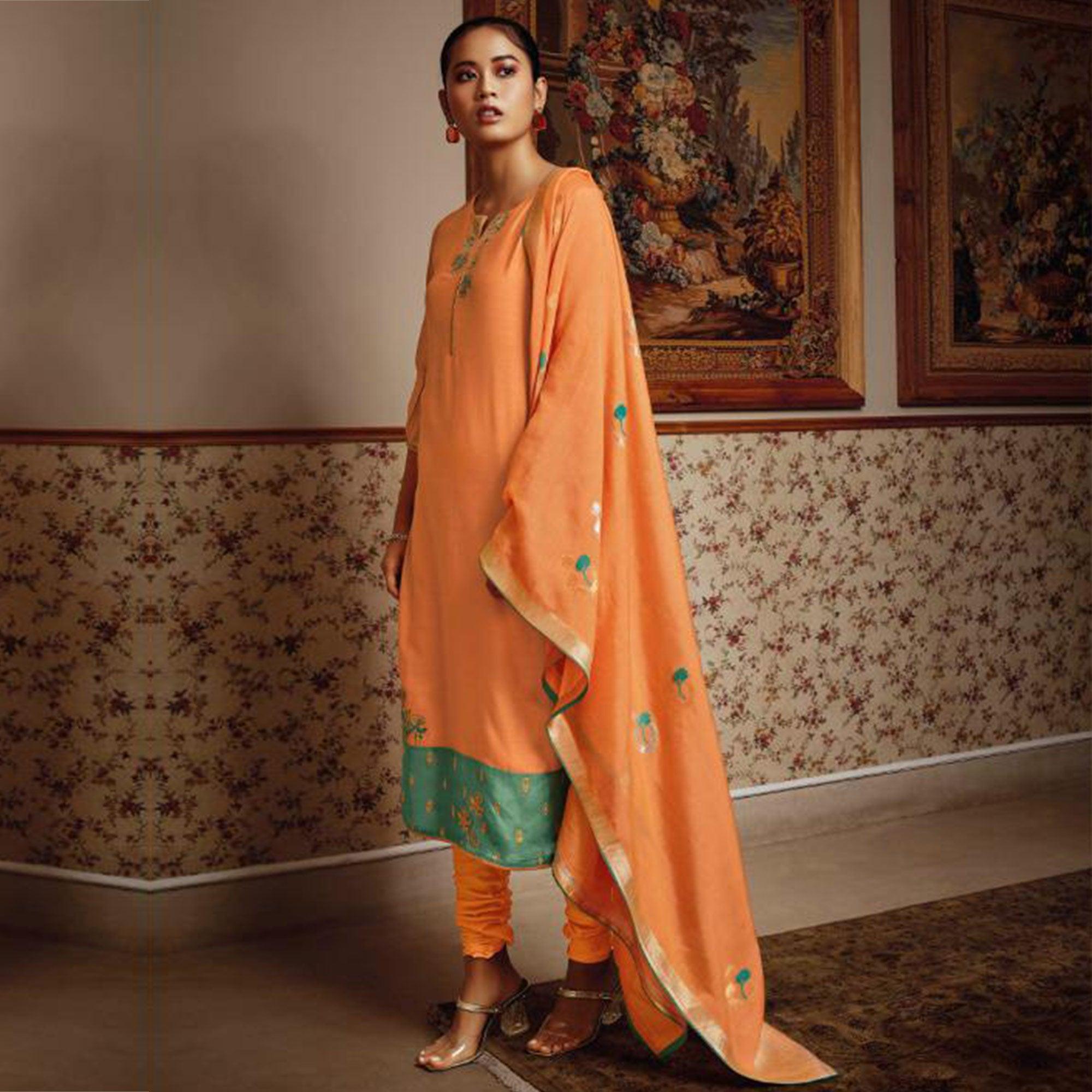 Adorning Orange Colored Partywear Embroidered Pure Silk Suit - Peachmode