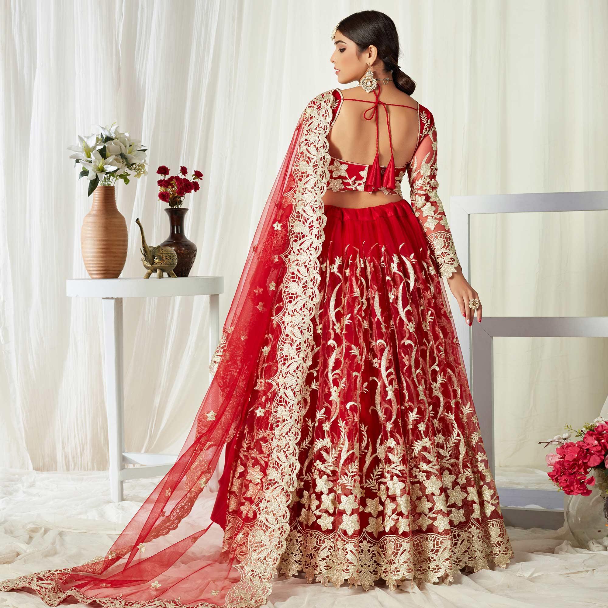 Adorning Red Colored Wedding Wear Butterfly Net With Embroidered Lehenga Choli - Peachmode