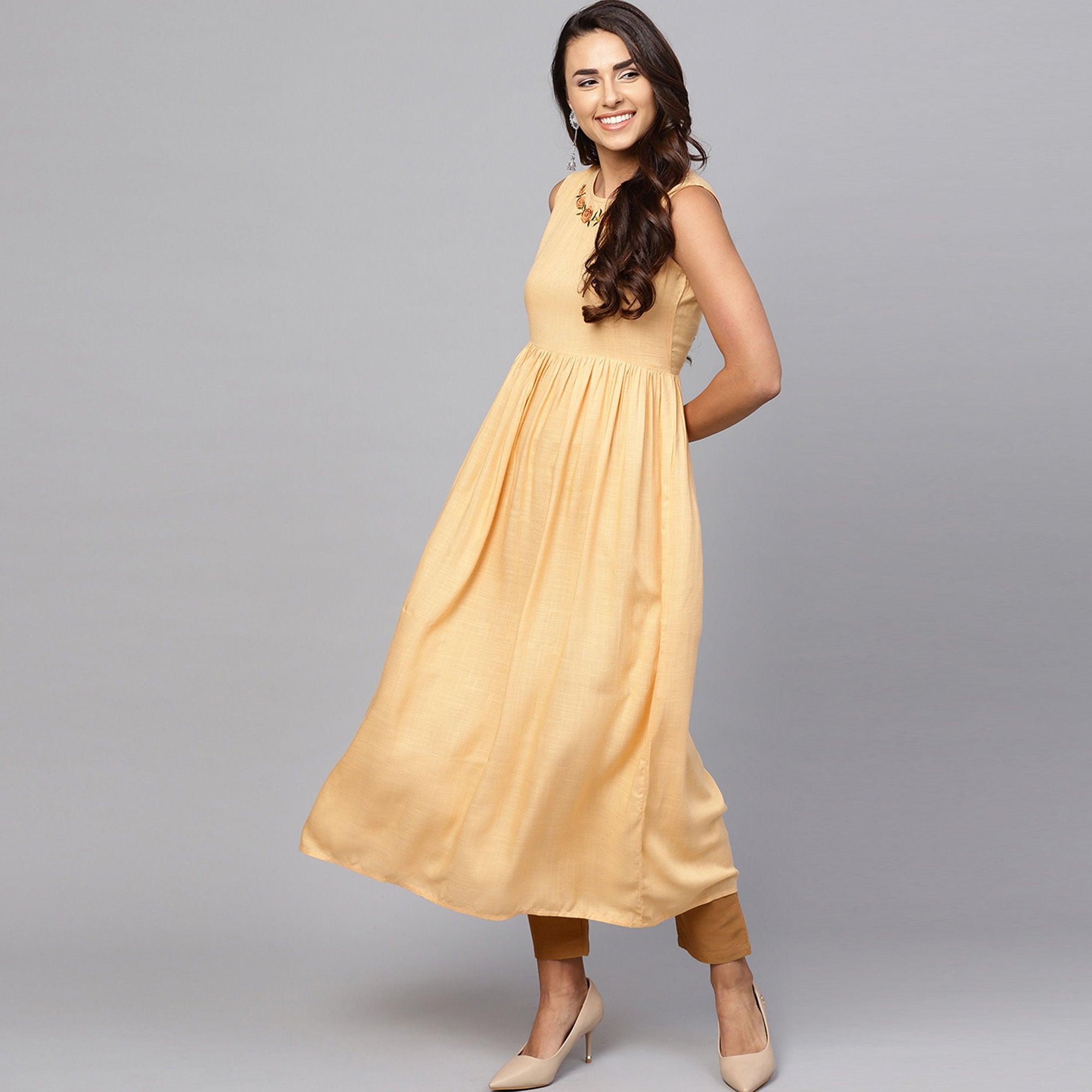 Alluring Beige-Mustard Yellow Colored Partywear Cotton Kurti - Peachmode