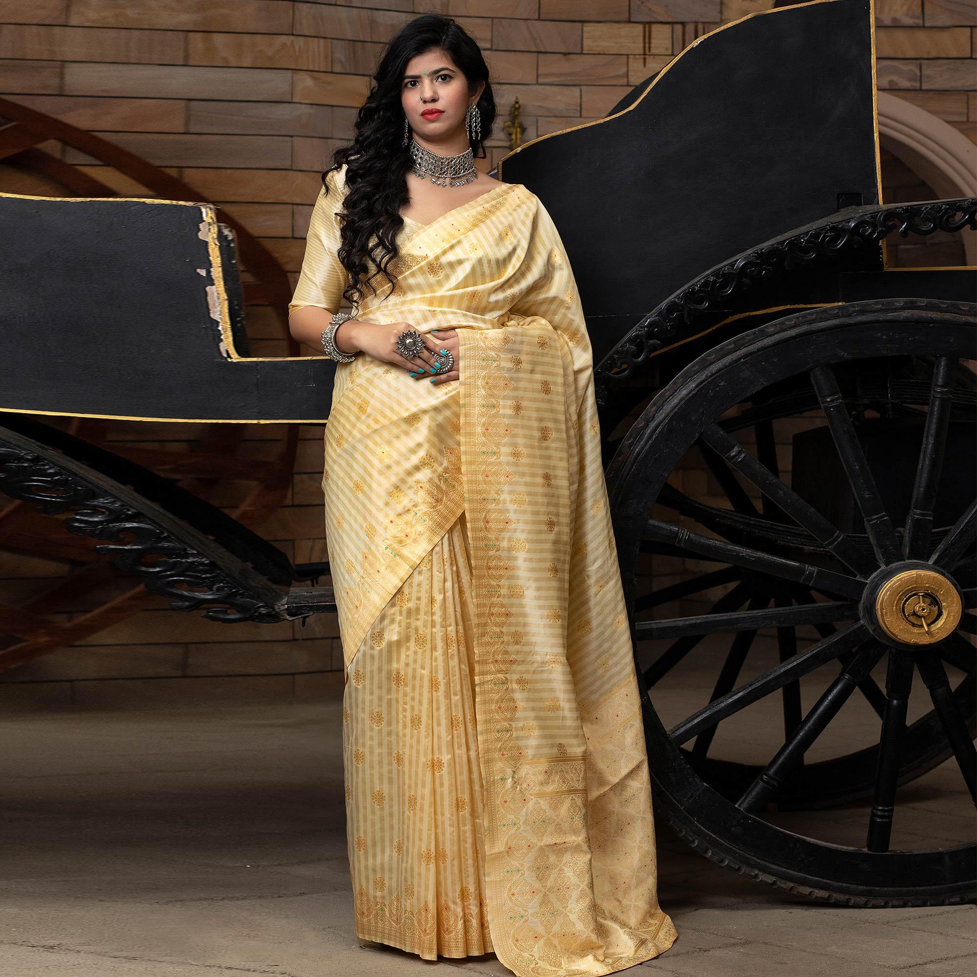Alluring Cream Colored Festive Wear Woven Banarasi Silk Saree - Peachmode
