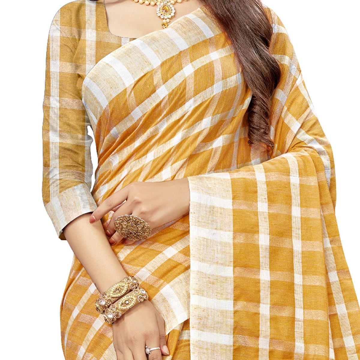 Alluring Mustard Yellow Colored Fesive Wear Checks Print Cotton Silk Saree With Tassels - Peachmode