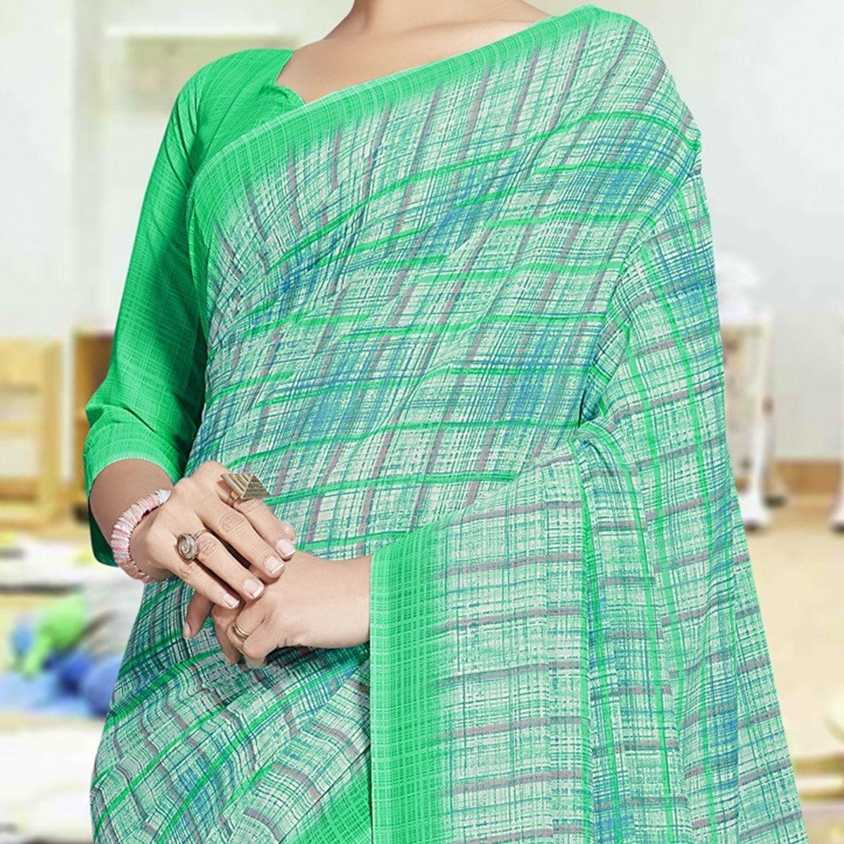 Amazing Aqua Green Colored Casual Printed Georgette Saree - Peachmode