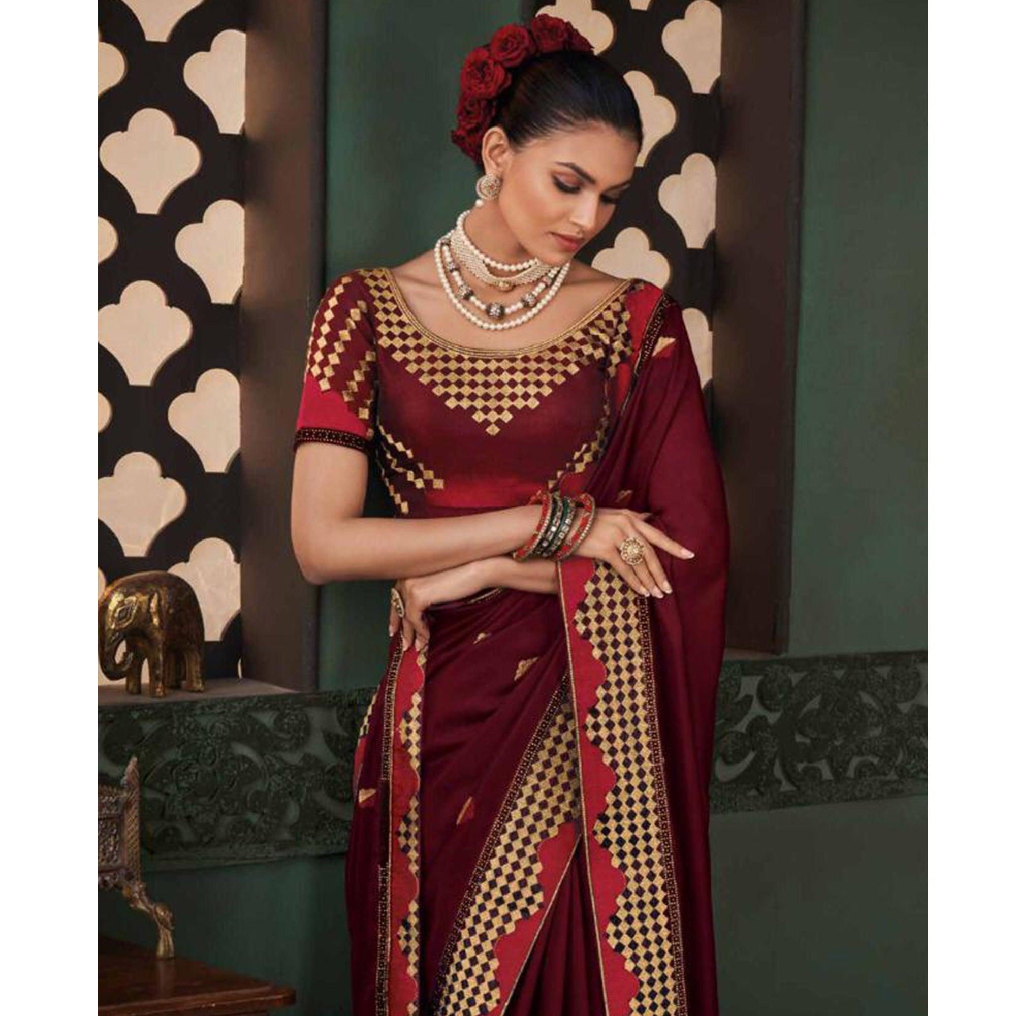 Amazing Maroon Colored Festive Wear Embroidered Heavy Border Silk Saree - Peachmode