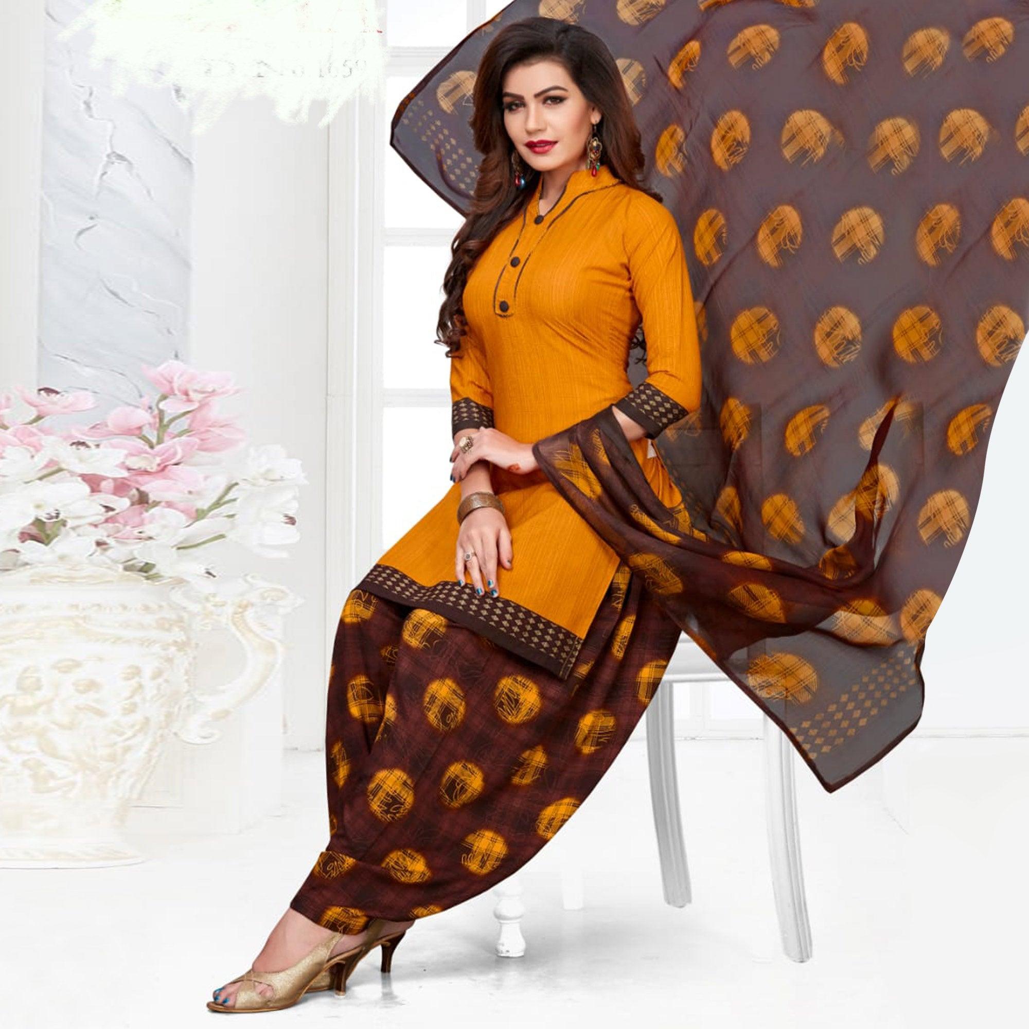 Appealing Orange Casual Printed Crepe Patiala Suit - Peachmode