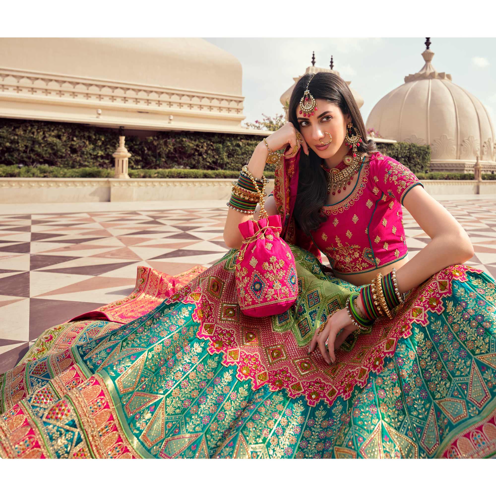 Aqua Blue-Green Partywear Embellished Embroiderd Banarasi Silk Lehenga - Peachmode