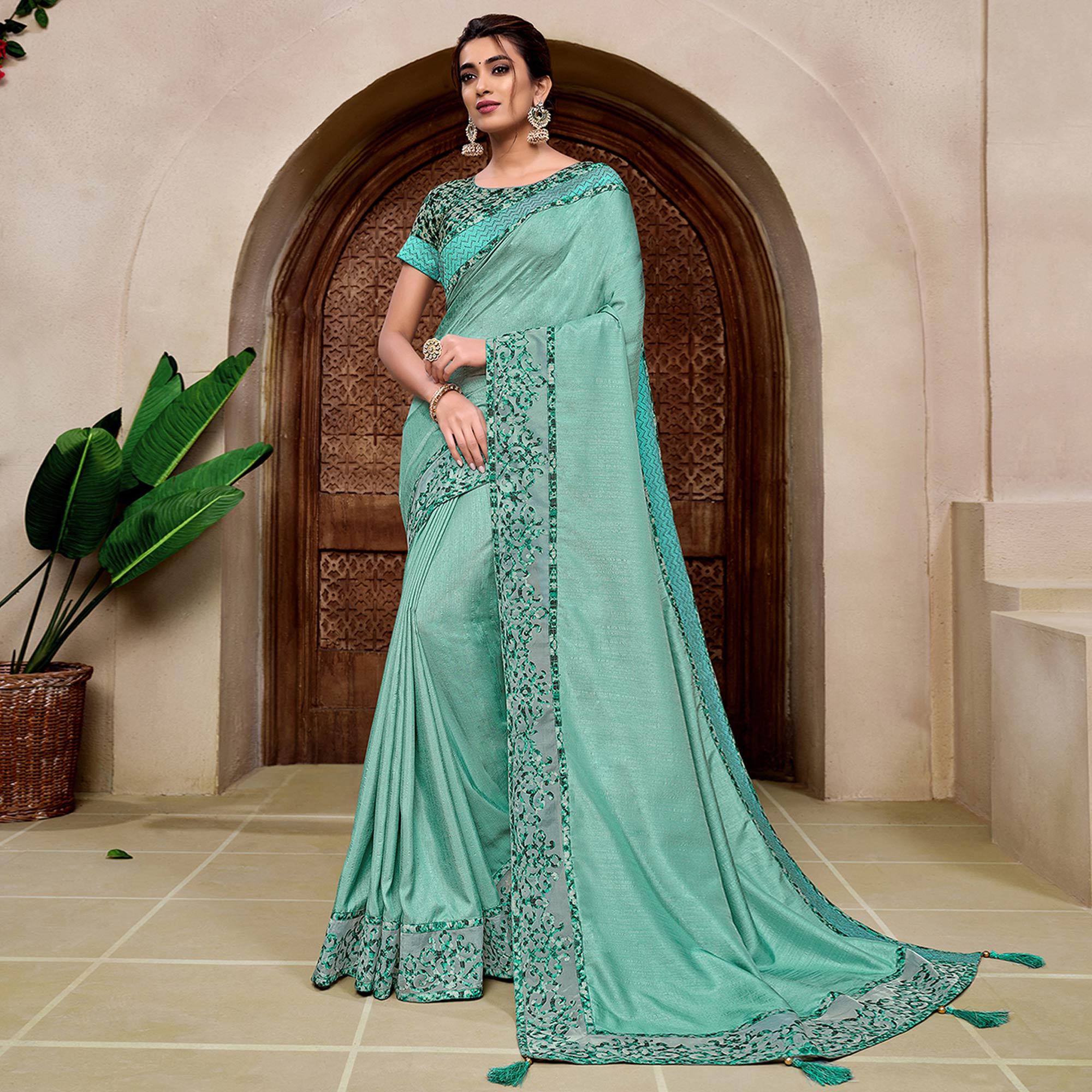 Aqua Blue Partywear Embellished Silk Saree - Peachmode