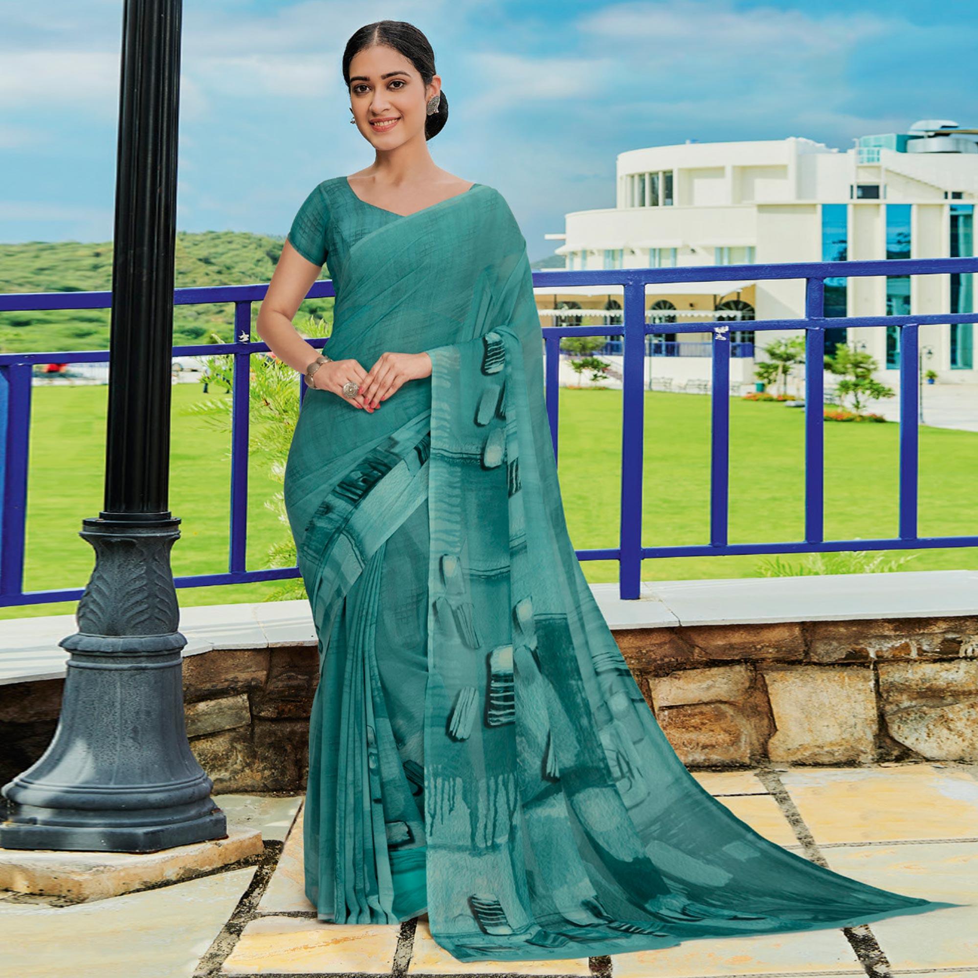 Aqua Blue Printed Georgette Saree - Peachmode