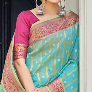 Aqua Blue Woven Organza Saree With Tassels - Peachmode