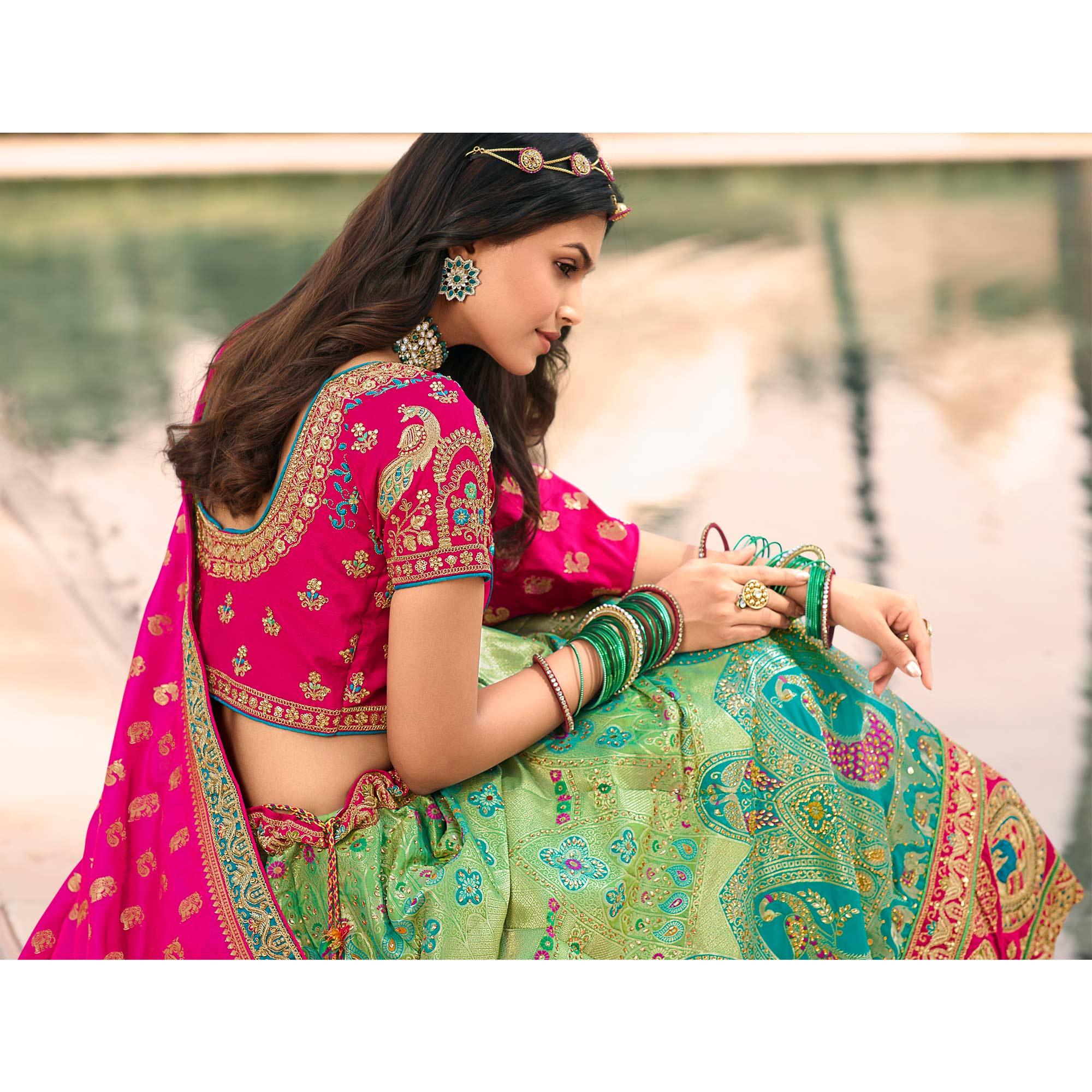 Aqua Green & Pink Wedding Wear Floral Embroidered With Woven Banarasi Silk Lehenga Choli - Peachmode