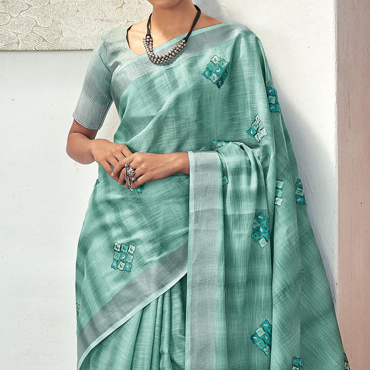 Aqua Green Casual Wear Embroidered Linen Saree With Tassels - Peachmode