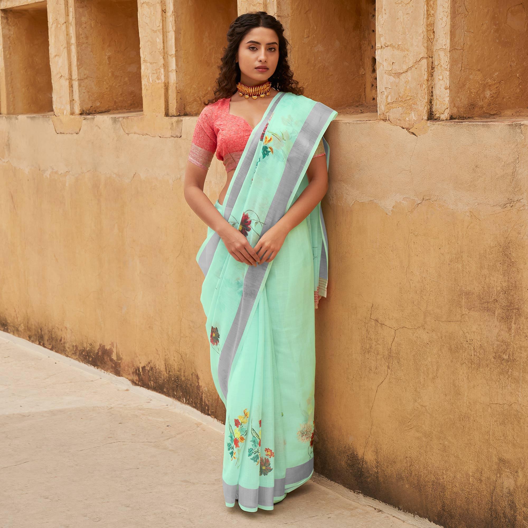 Aqua Green Casual Wear Floral Printed Zari Border Soft Linen Cotton Saree - Peachmode