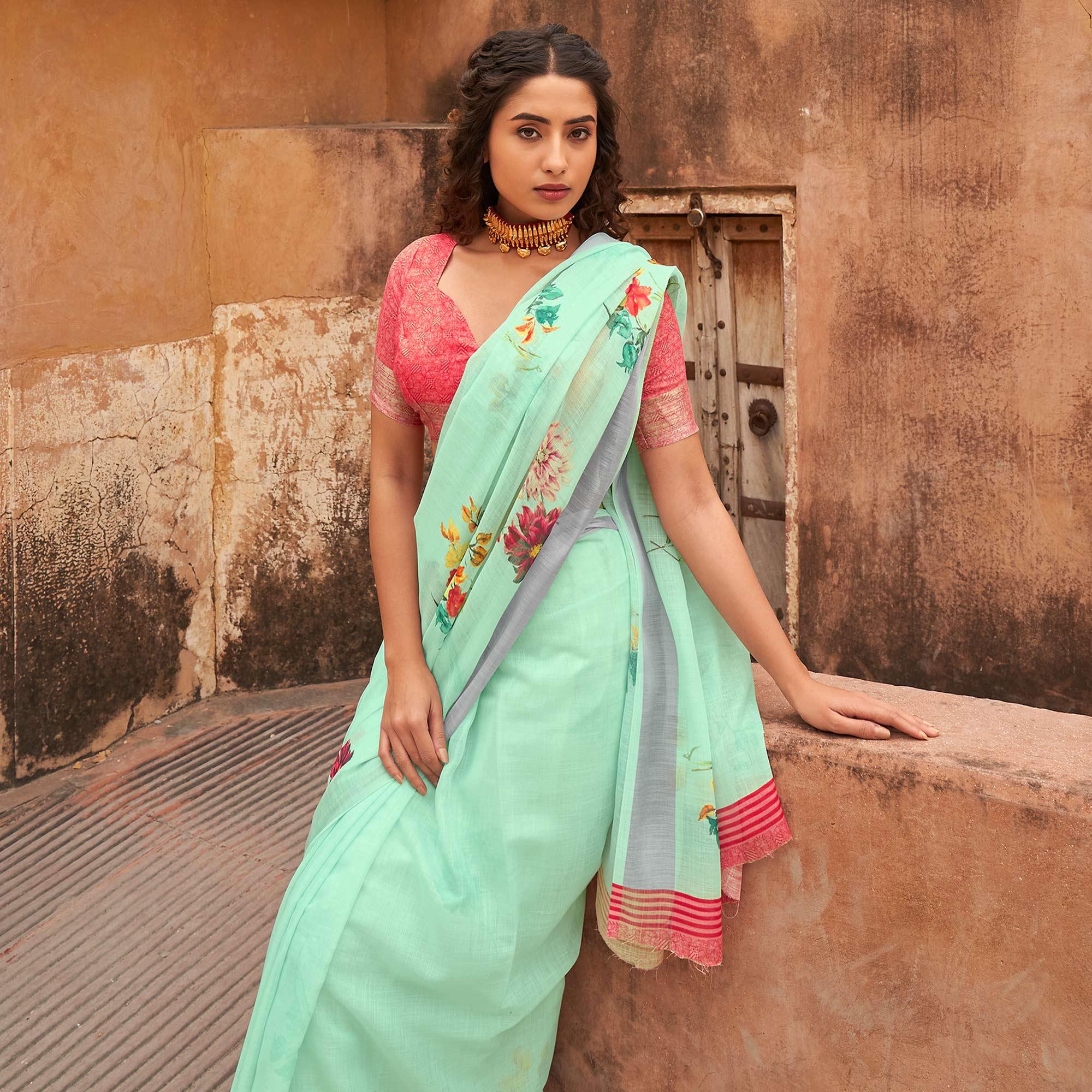 Aqua Green Casual Wear Floral Printed Zari Border Soft Linen Cotton Saree - Peachmode