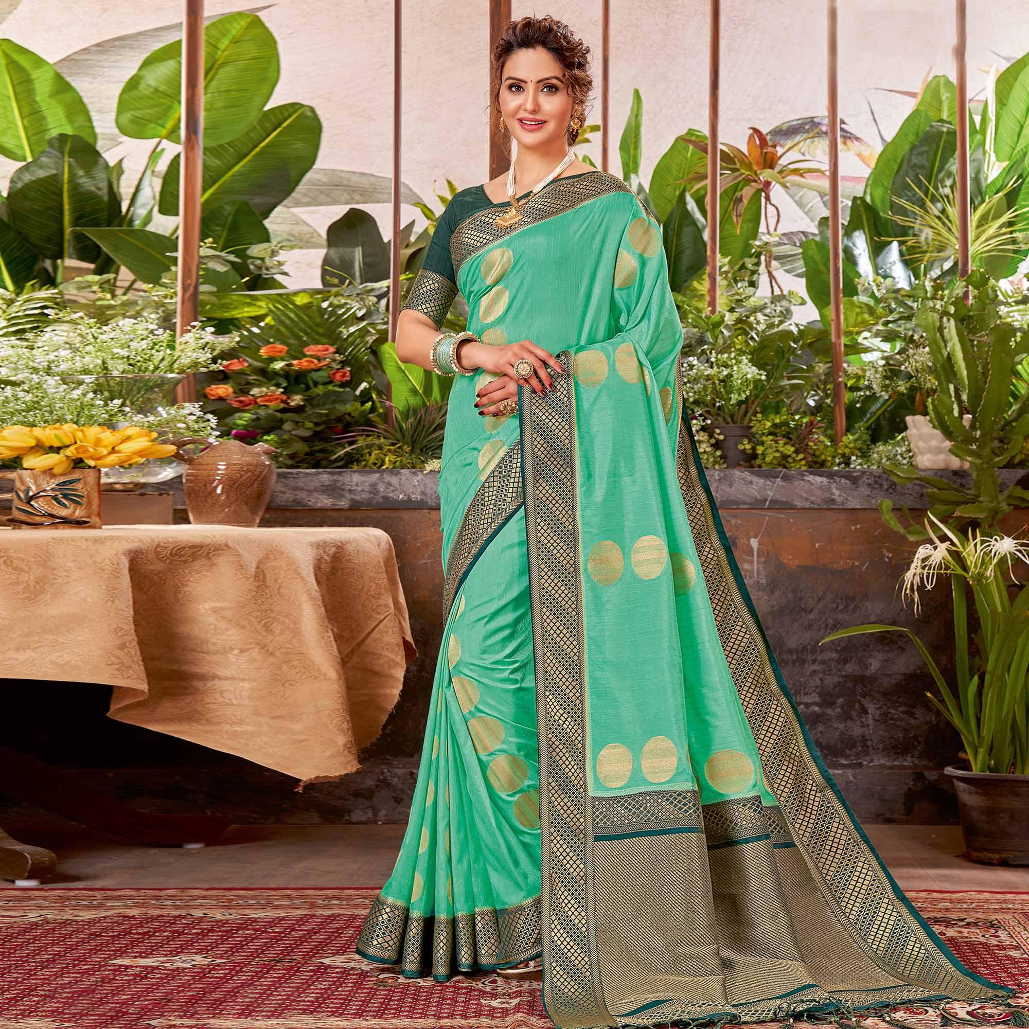 Aqua Green Festive Wear Woven Silk Saree With Tassels - Peachmode