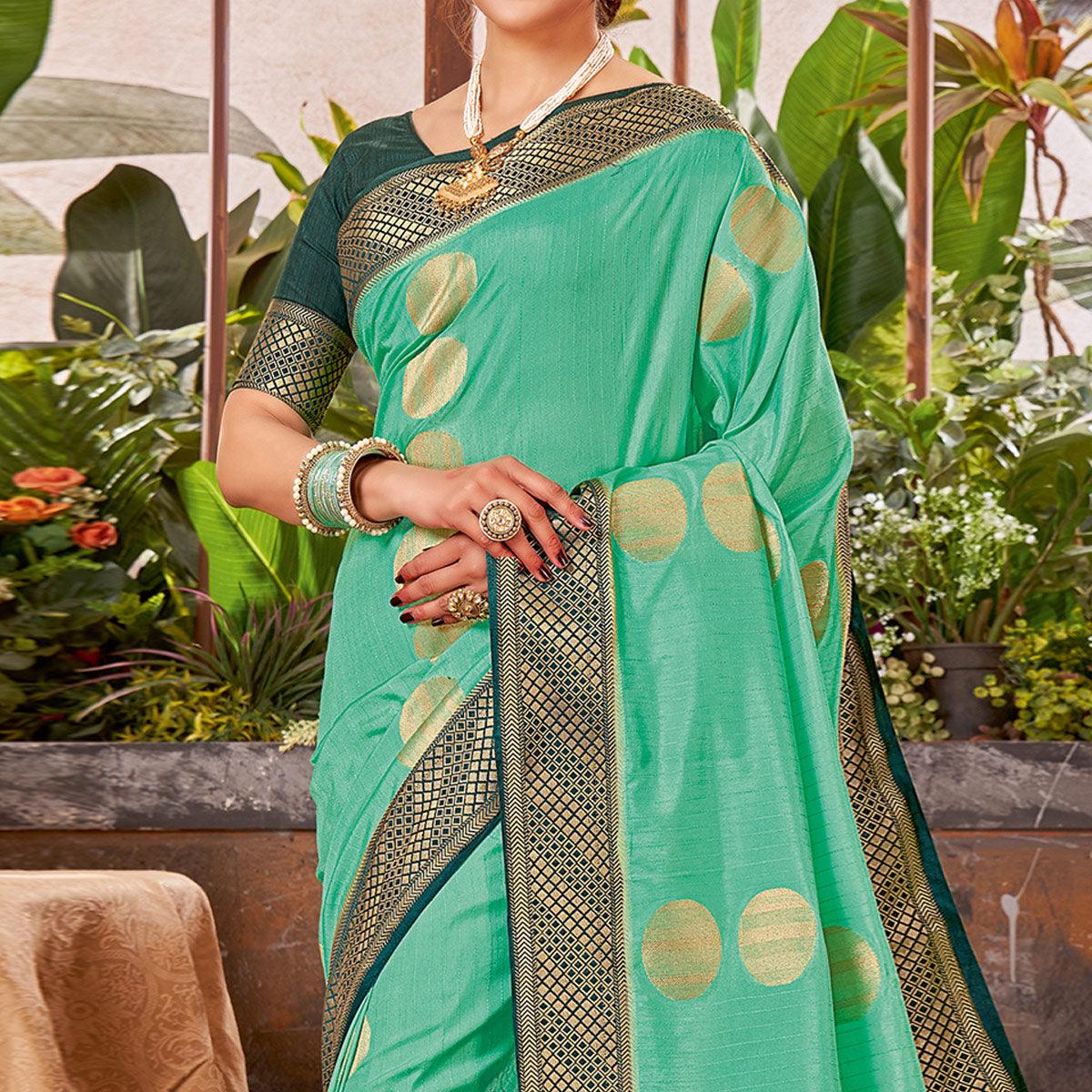 Aqua Green Festive Wear Woven Silk Saree With Tassels - Peachmode