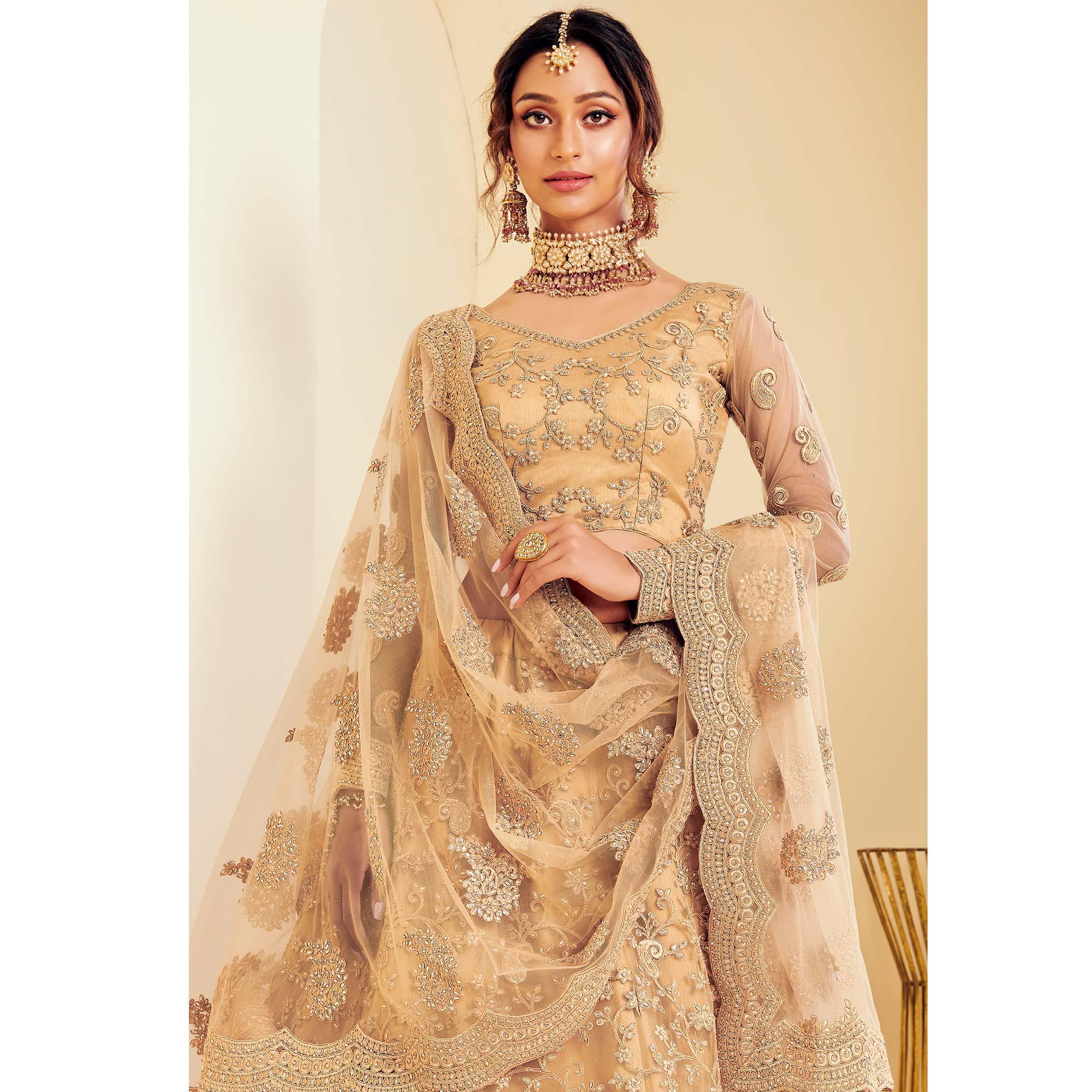 Arresting Golden Coloured Wedding Wear Cording Embroidered Net Lehenga Choli - Peachmode
