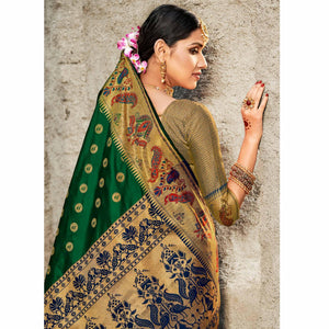 Arresting Green Colored Festive Wear Woven Banarasi Silk Saree With Tassels - Peachmode
